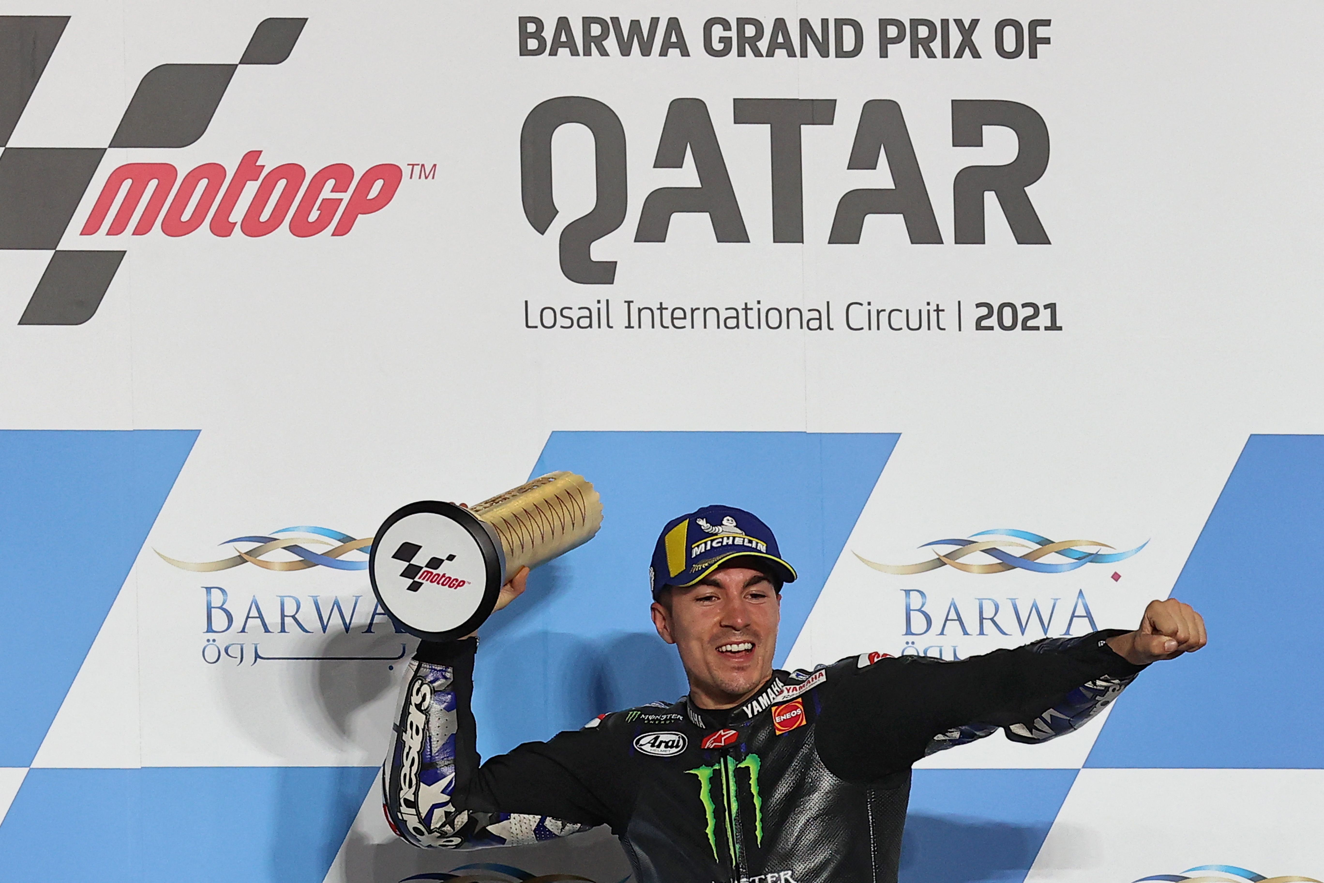 Pembalap Monster Energy Yamaha Maverick Vinales merayakan kemenangan di GP Qatar.