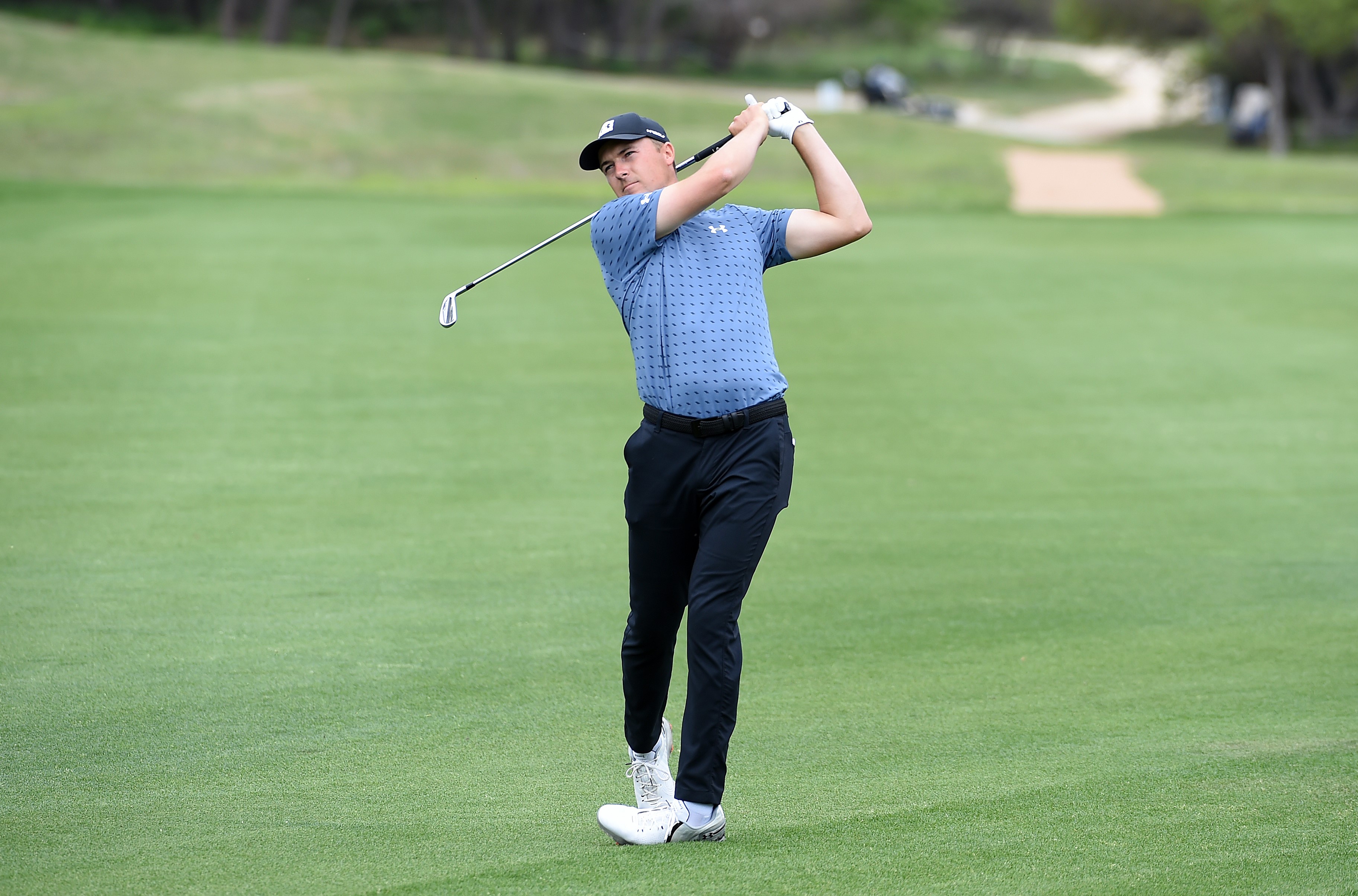 Aksi mantan pegolf peringkat satu dunia, Jordan Spieth, di ajang turnamen Texas Open di San Antonio, Texas, AS, Minggu (4/3).