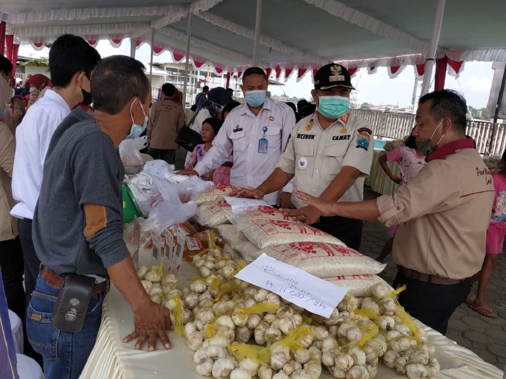 Pelaksanaan pasar murah di Kampung Kapitan Palembang yang dilaksanakan oleh Dinas Ketahanan Pangan Provinsi Sumsel.