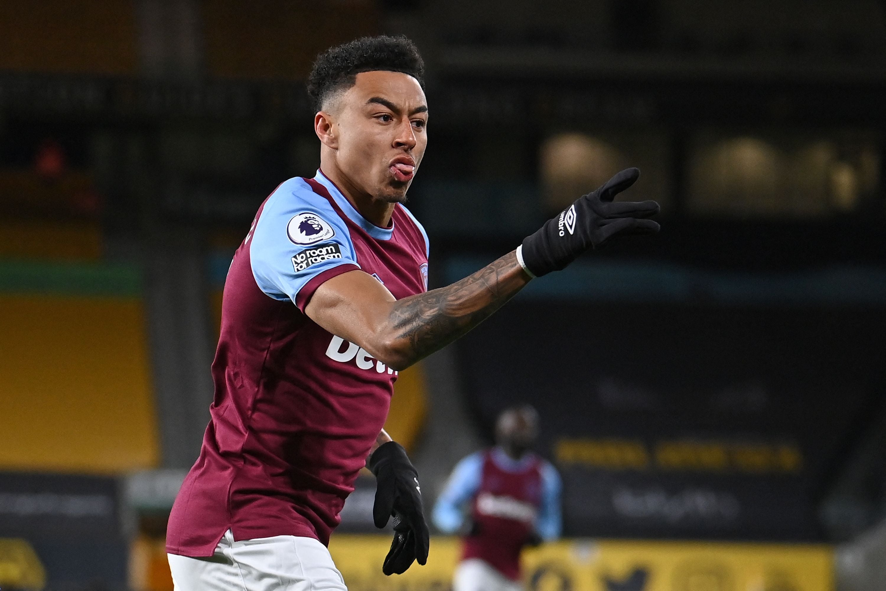 Gelandang West Ham United Jesse Lingard melakukan selebrasi usai mencetak gol ke gawang Wolverhampton Wanderers di laga Liga Primer Inggris.