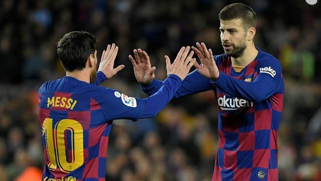 Lionel Messi dan Gerard Pique