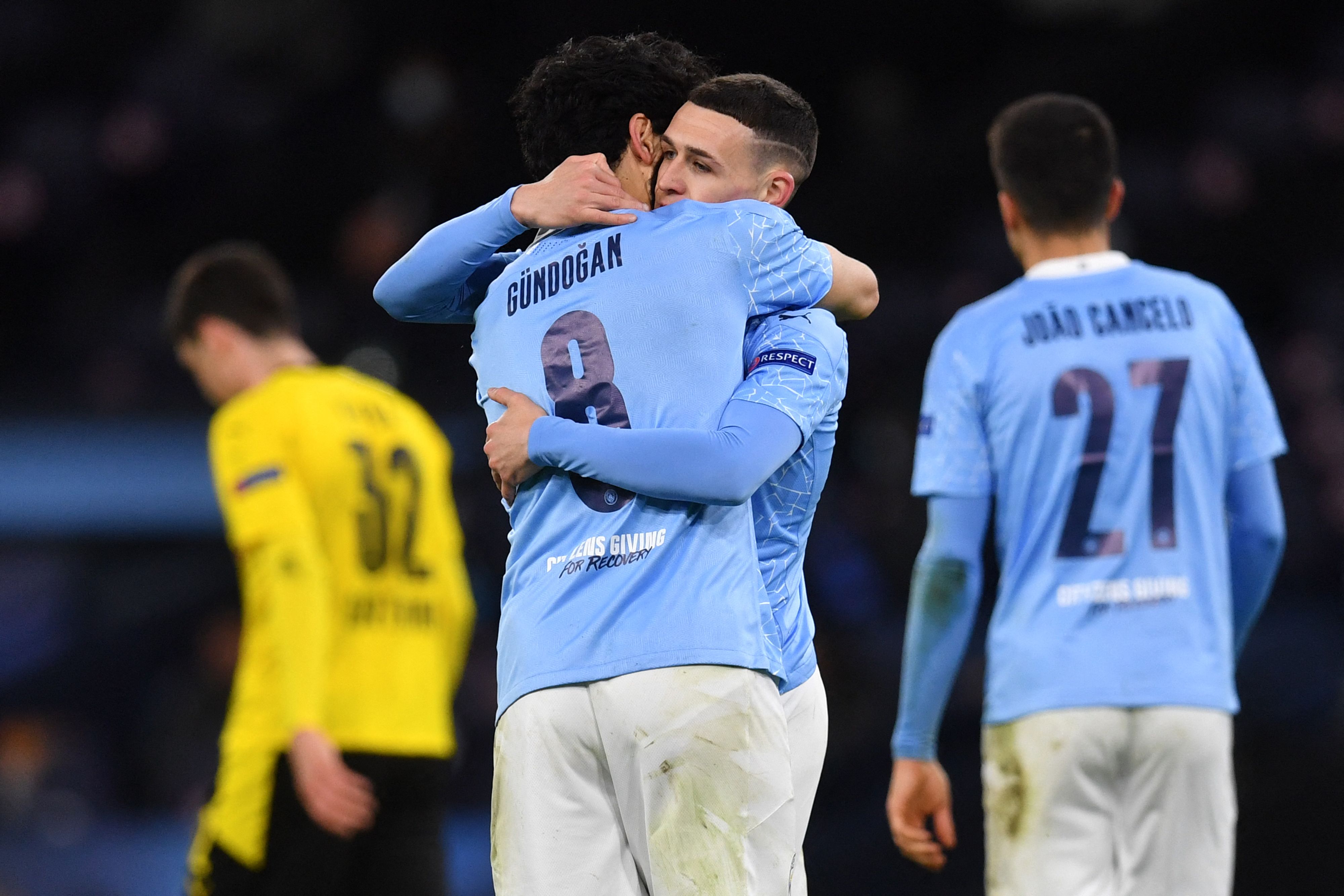 Phil Foden merayakan golnya ke gawang Borrusia dortmund