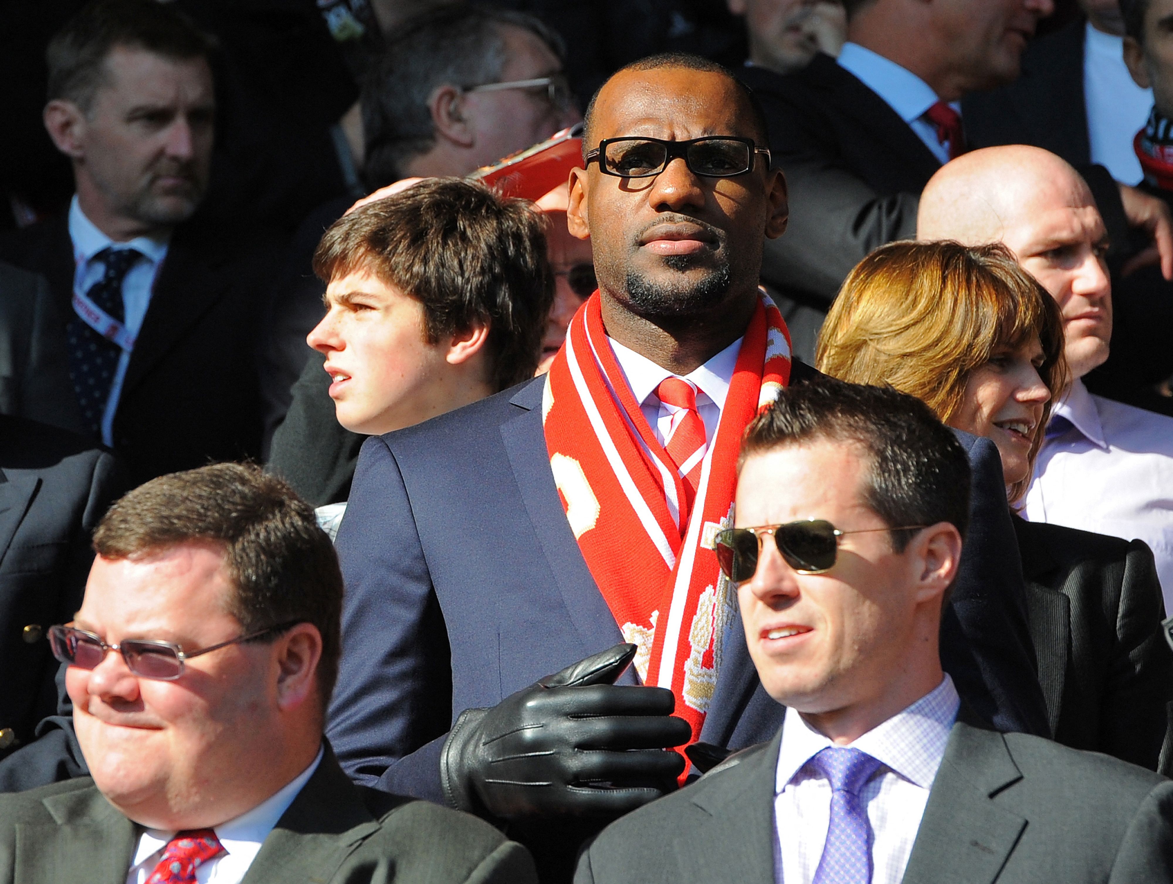 Bintang NBA LeBron James saat menyaksikan laga Liverpool di Stadion Anfield.