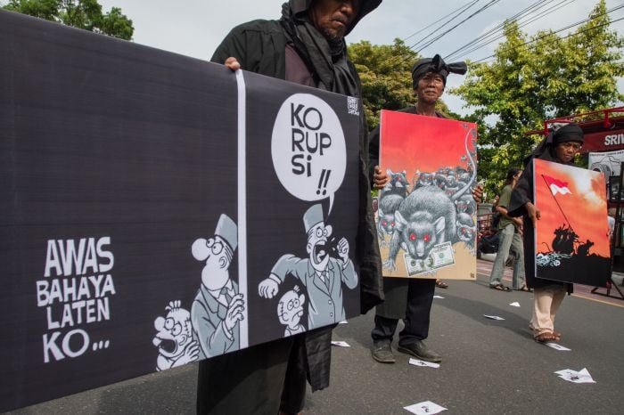 Poster anti korupsi pada Hari Peringatan Hari Anti Korupsi Sedunia.  