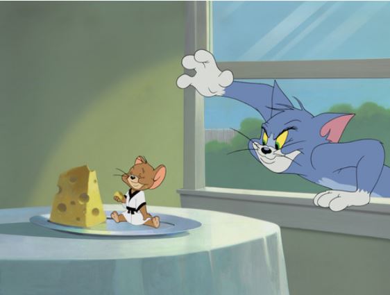 Tom menggunakan keju untuk menangkap Jerry.