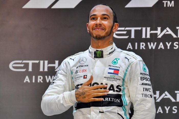 Ilustrasi: Pembalap Formula 1 Lewis Hamilton saat merayakan kemenangan. 