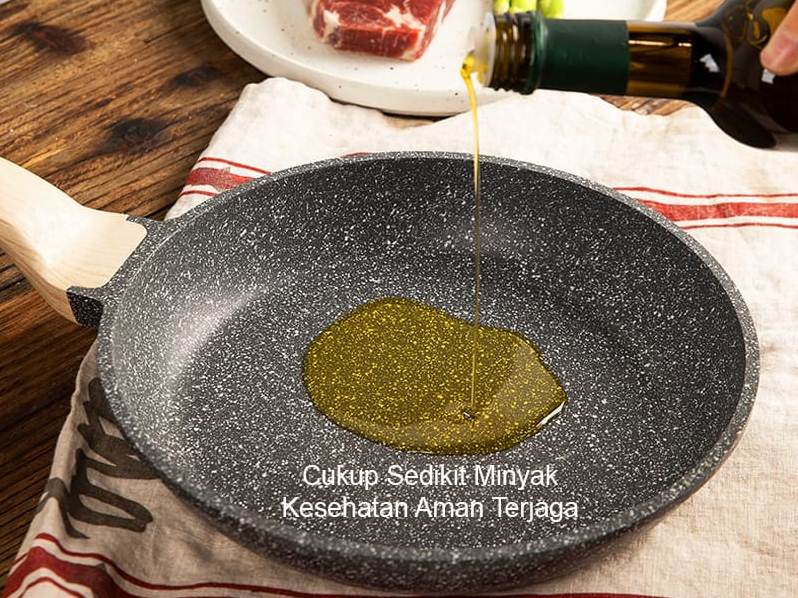 Wajan dengan batu maifan.