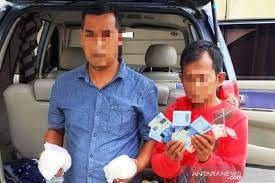 Polisi tangkap dua pengedar uang palsu di Nagan Raya Aceh.