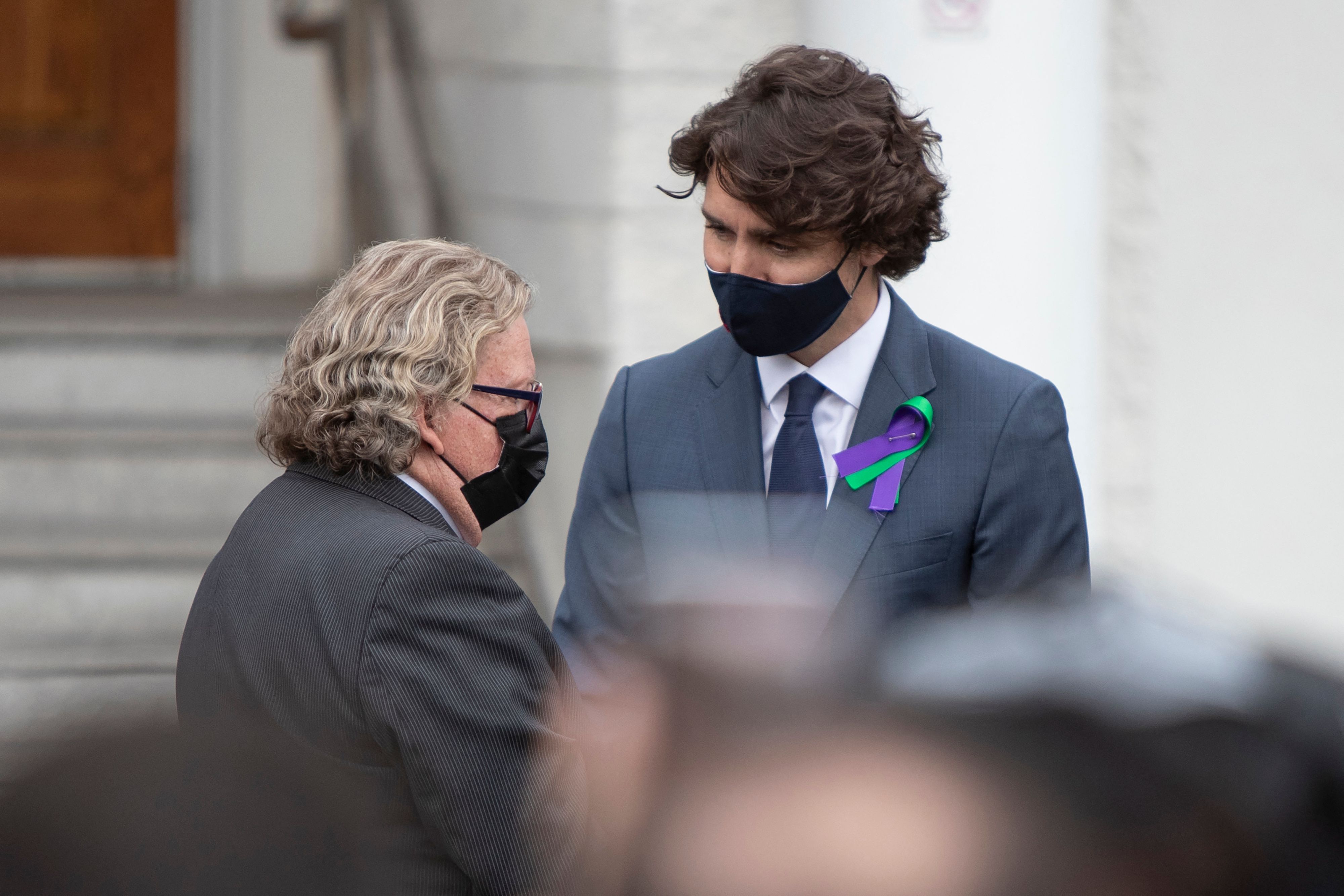 PM Kanada Justin Trudeau disambut Wali Kota London Ed Holder untuk membahas masalah pembunuhan satu keluarga muslim. 