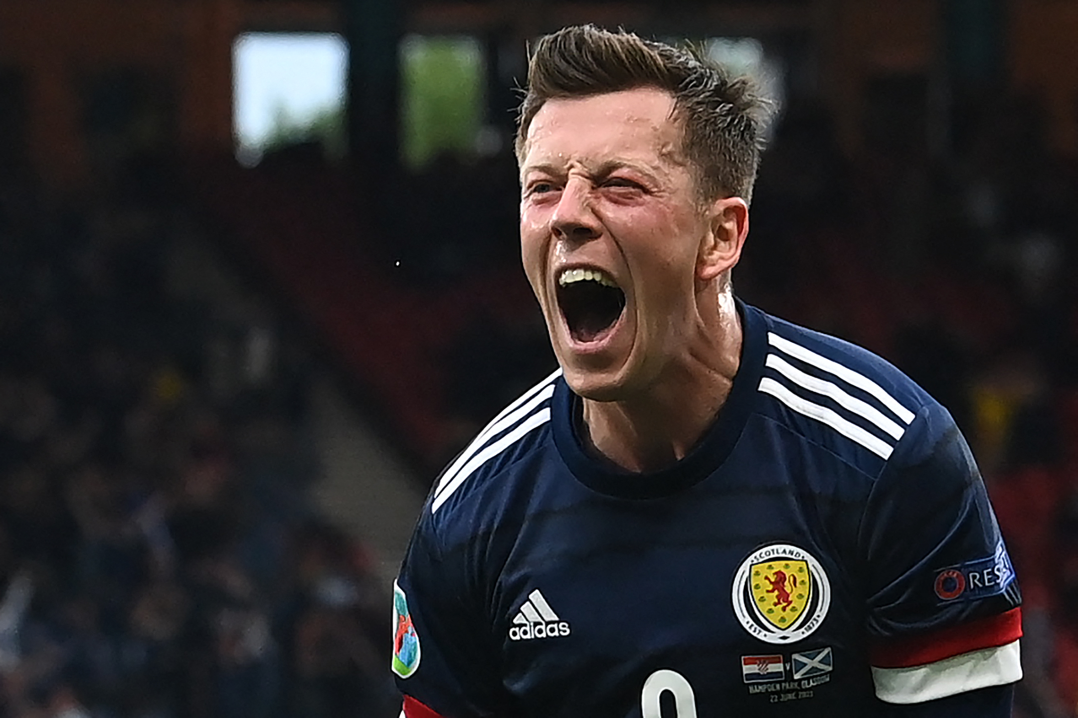 Gelandang Skotlandia Callum McGregor melakukan selebrasi usai mencetak gol ke gawang Kroasia di laga Piala Eropa.