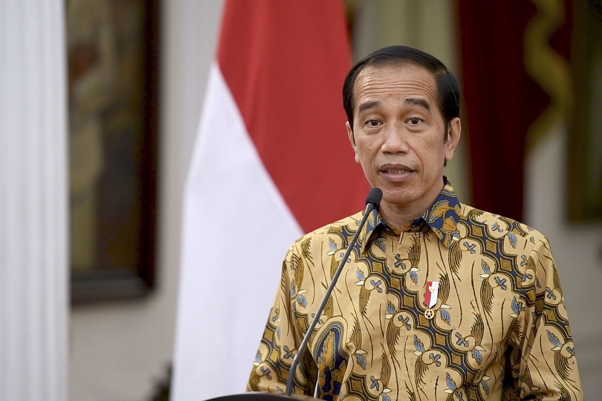 Presiden Joko Widodo saat menyampaikan keterangan pers secara virtual.