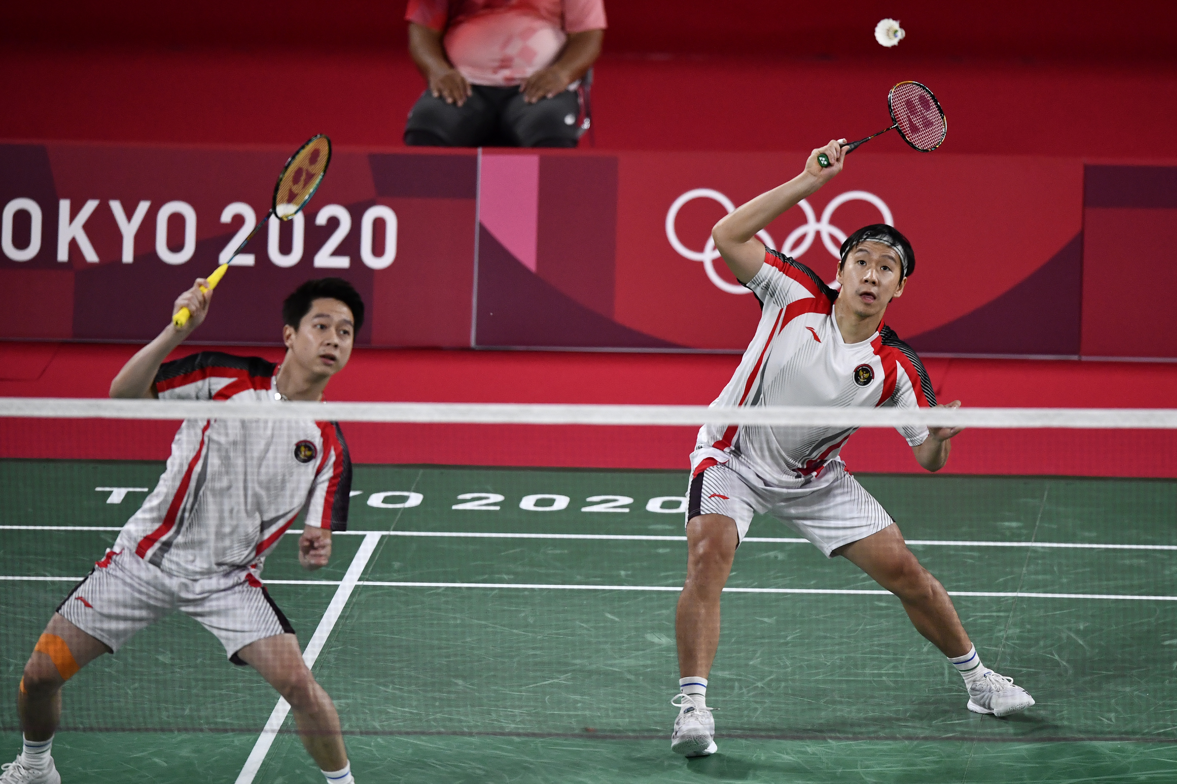 Ganda putra Indonesia Marcus Fernaldi Gideon/Kevin Sanjaya Sukamuljo terhenti diperempat final bulu tangkis Olimpiade Tokyo 2020.