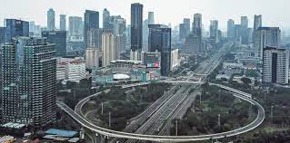 Foto udara kawasan pusat bisnis di Jakarta yang lengang saat pemberlakuan pembatasan sosial berskala besar (PSBB), Jumat (10/4/2020).