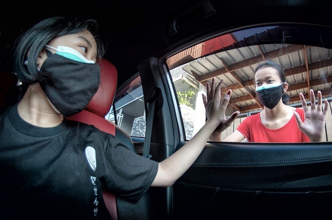 Foto karya Hadrani Hasan yang menyabet juara 1 Lomba Foto Pakai Masker Dobel yang digelar koran Media Indonesia.