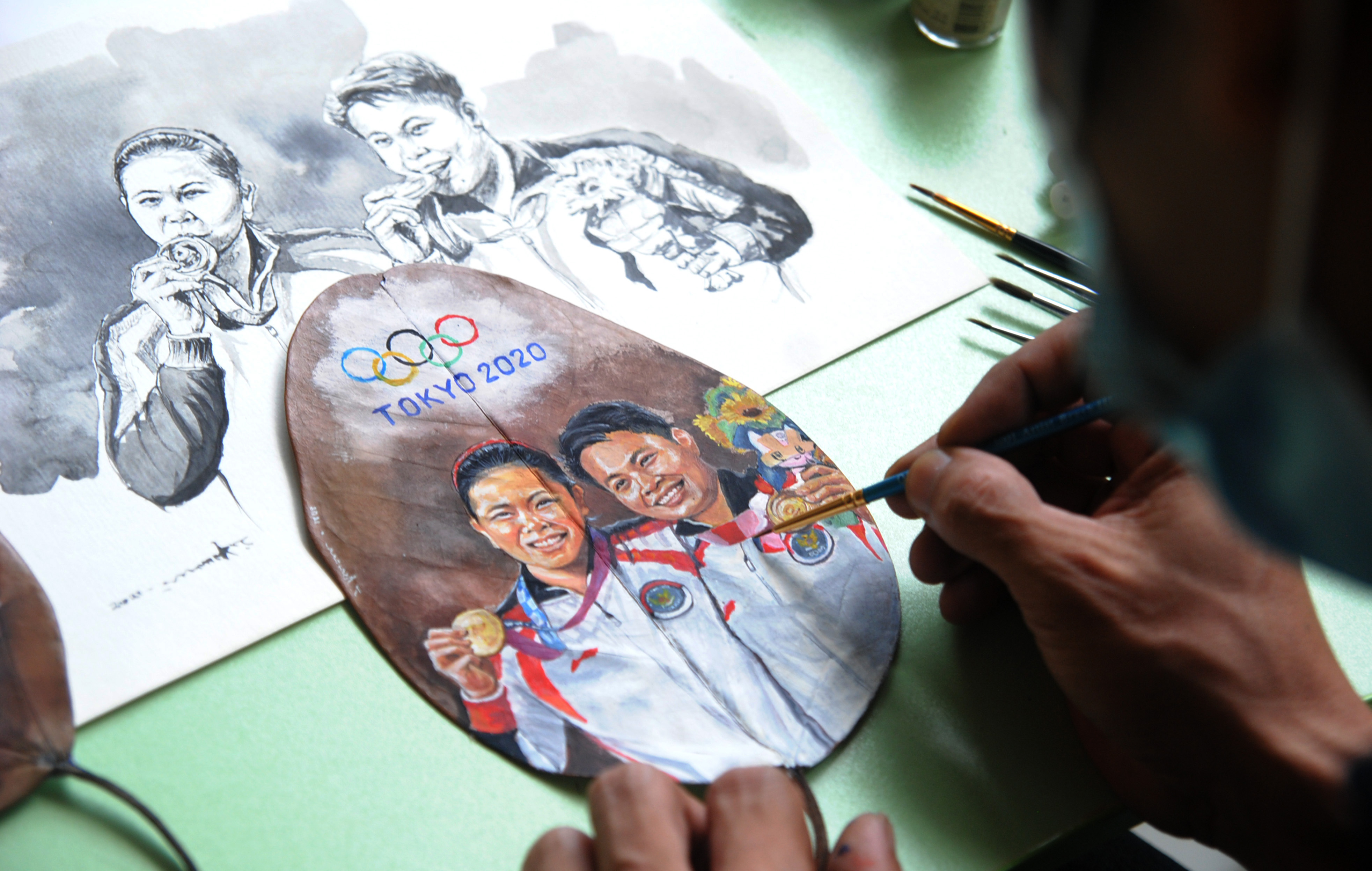 Peraih medali emas Olimpiade Tokyo 2020, Greysia Polii dan Apriyani Rahayu