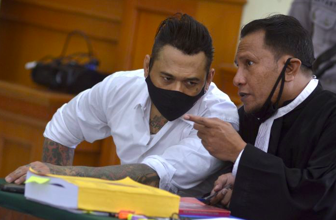 Drummer Superman is Dead I Gede Ari Astina alias Jerinx saat mengikuti agenda persidangan.