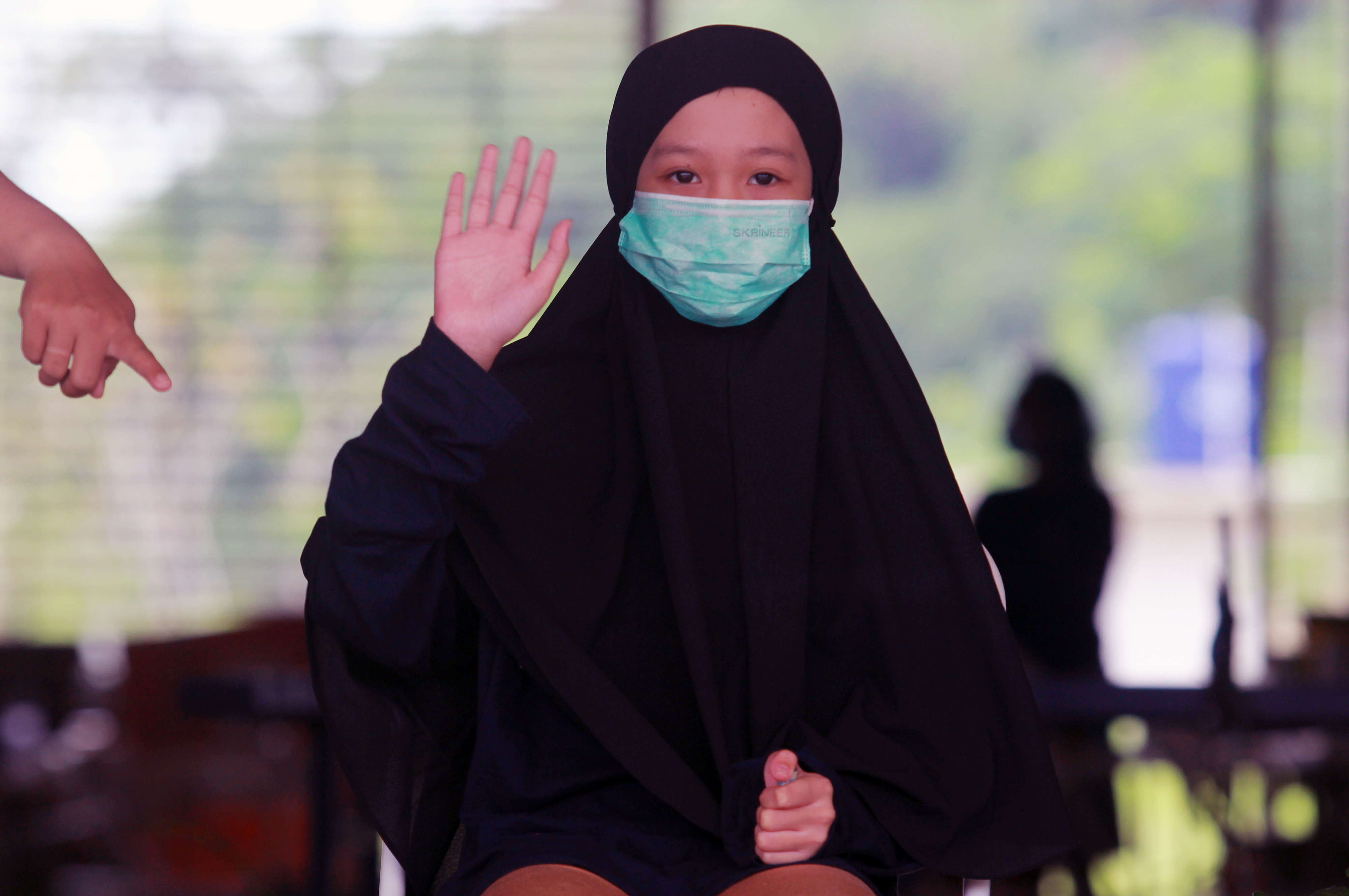  Aisyah Alusa,10, dari Serpong, Tangerang Selatan merupakan anak yatim piatu karena kedua orang tuanya meninggal dunia akibat Covid-19.