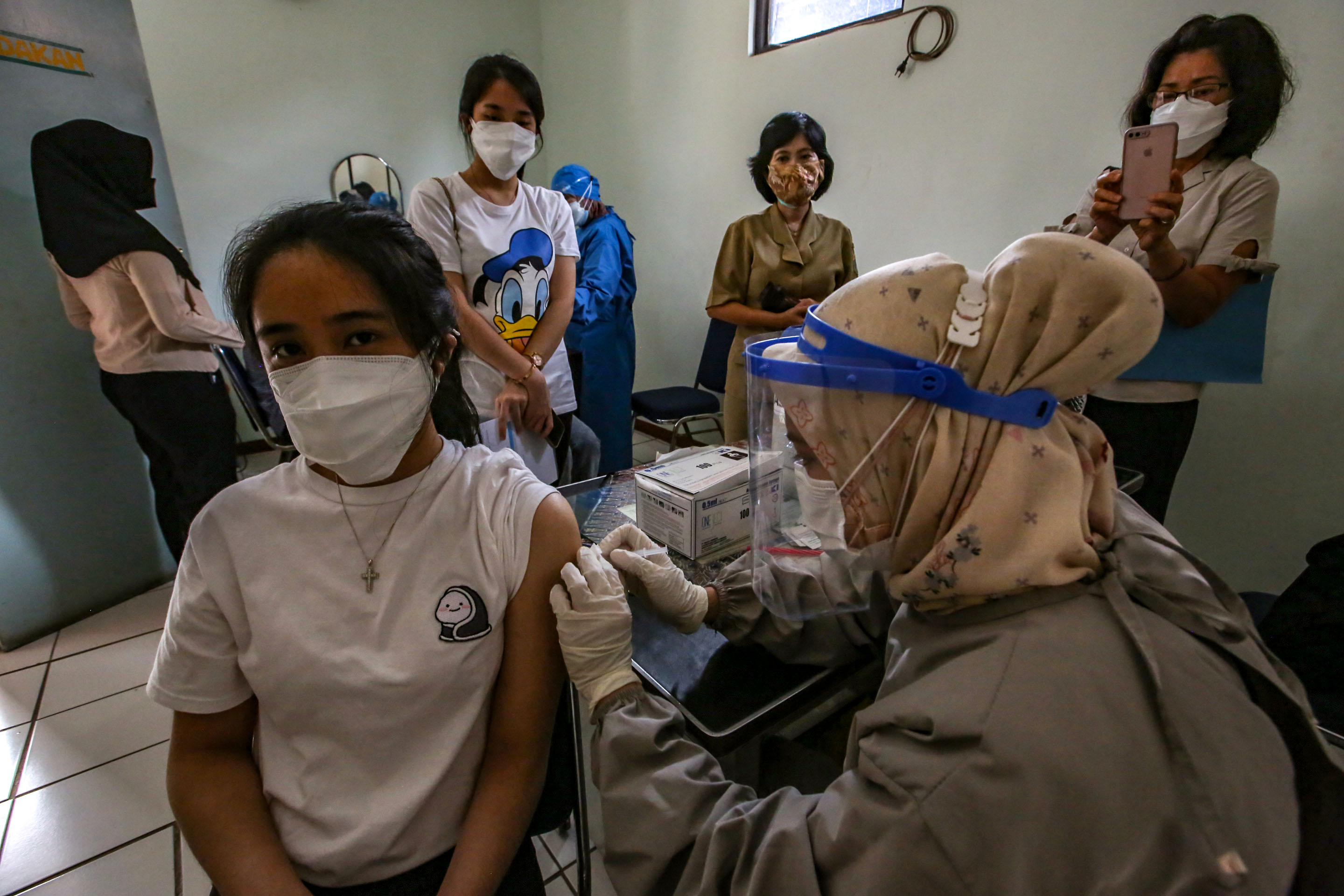 Ilustrasi vaksinasi covid-19