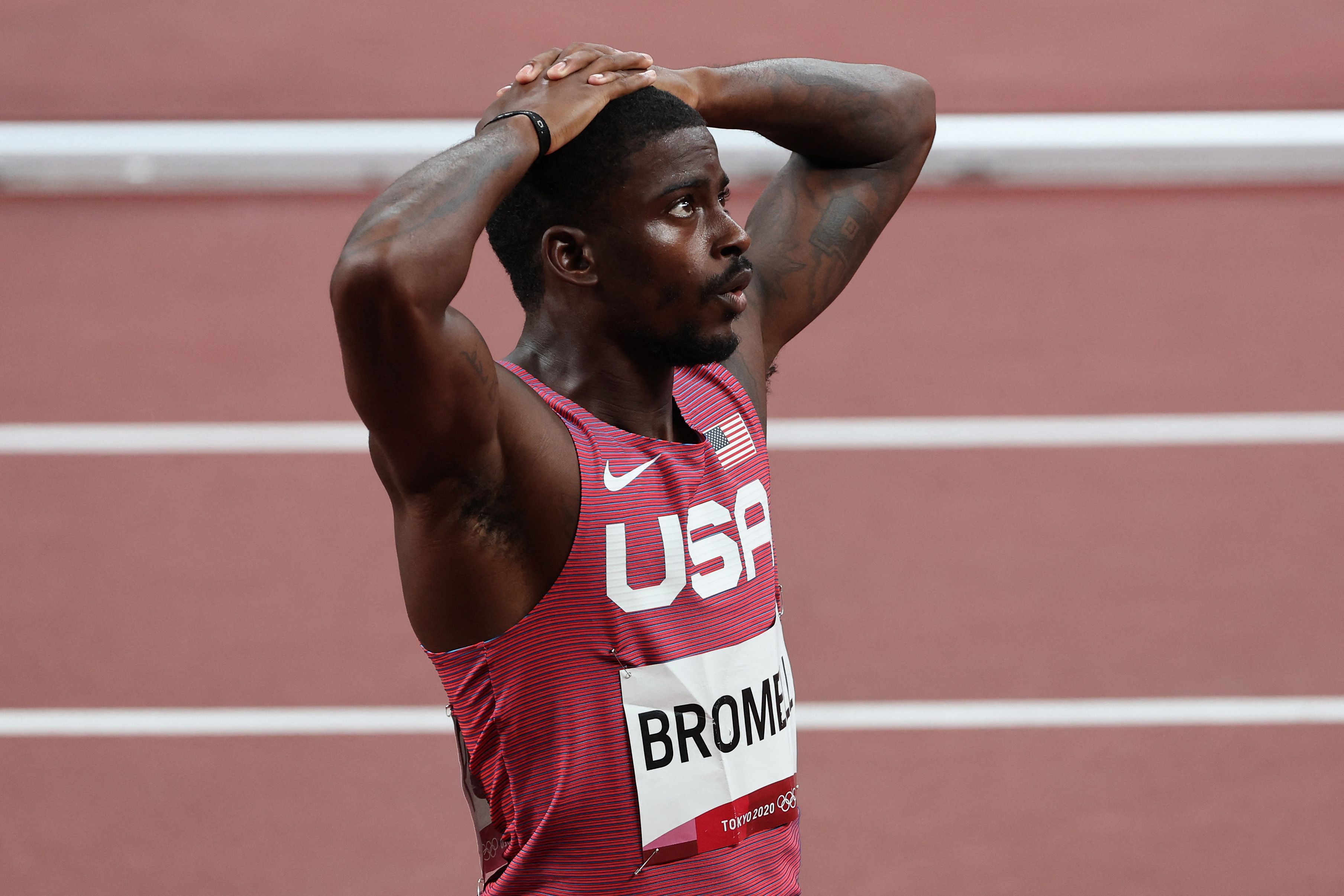 Pelari Amerika Serikat Trayvon Bromell bereaksi usai gagal melaju ke final nomor lari 100 meter.
