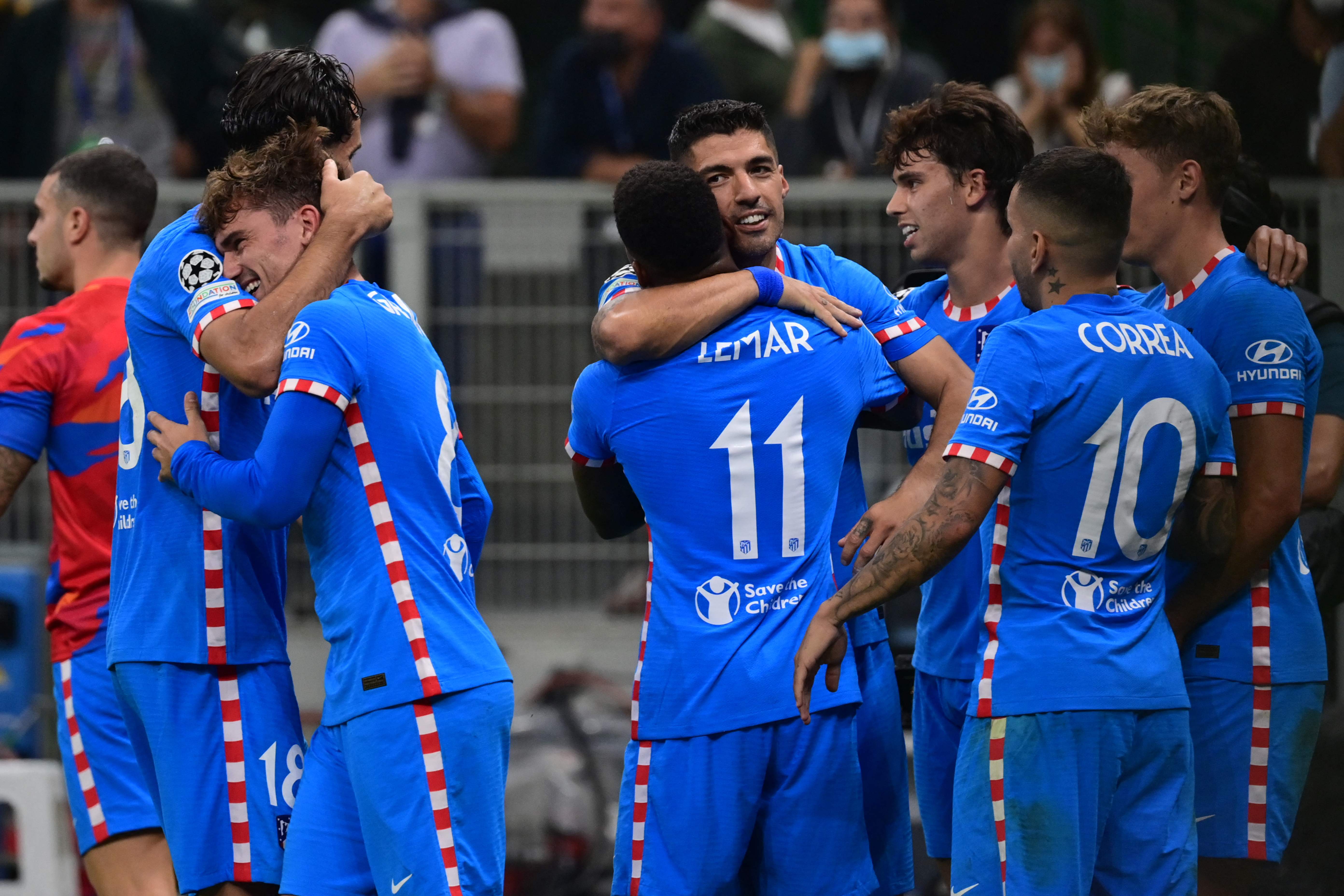 Para pemain Atletico Madrid melakukan selebrasi usai mencetak gol ke gawang AC Milan di laga Liga Champions. 