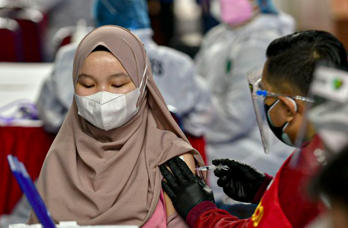 Ilustrasi - Vaksinasi Covid-19.