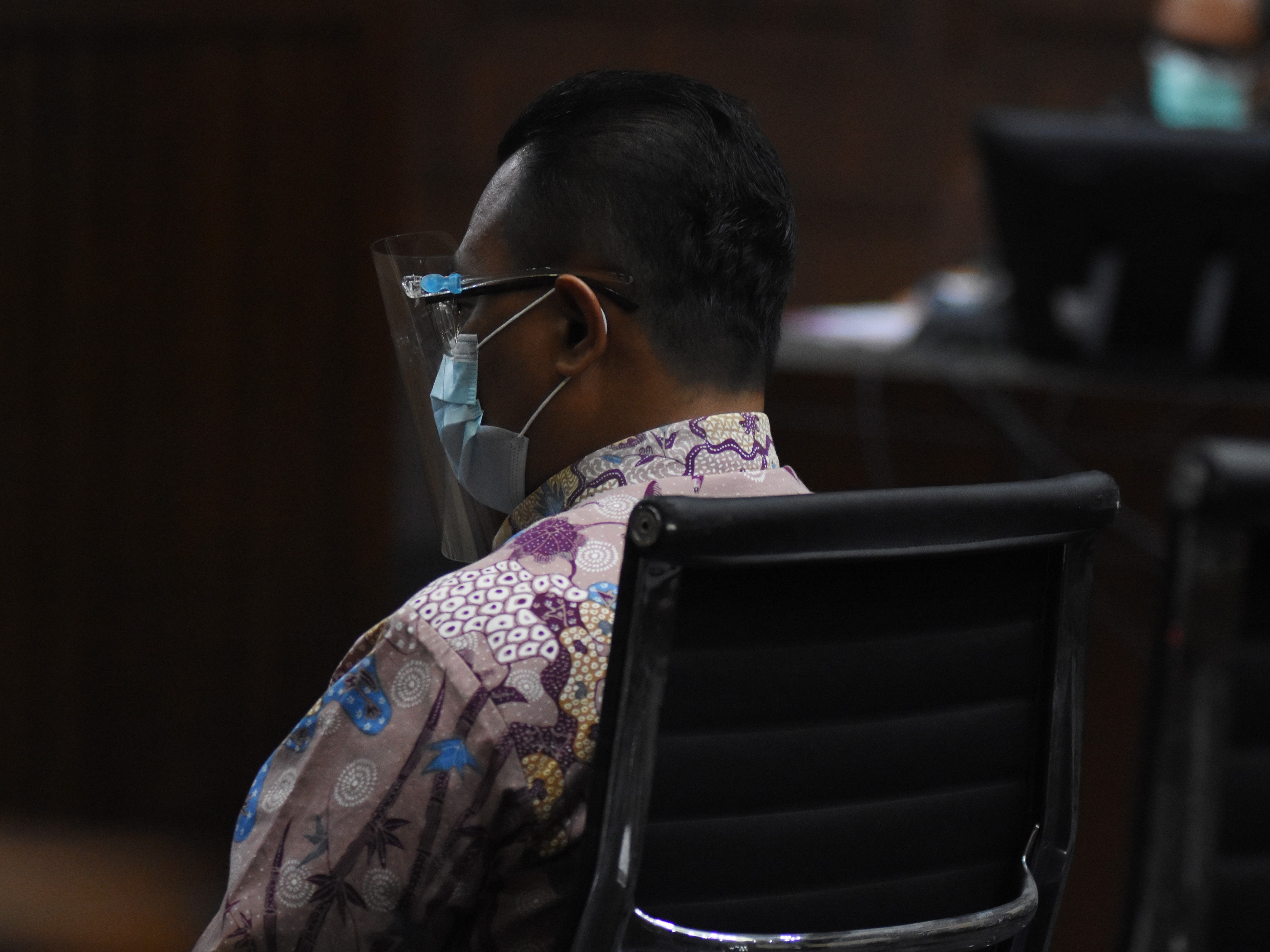 Terdakwa mantan Kepala Subdirektorat Kerja Sama dan Dukungan Pemeriksaan Ditjen Pajak Dadan Ramdani menjalani sidang perdana.