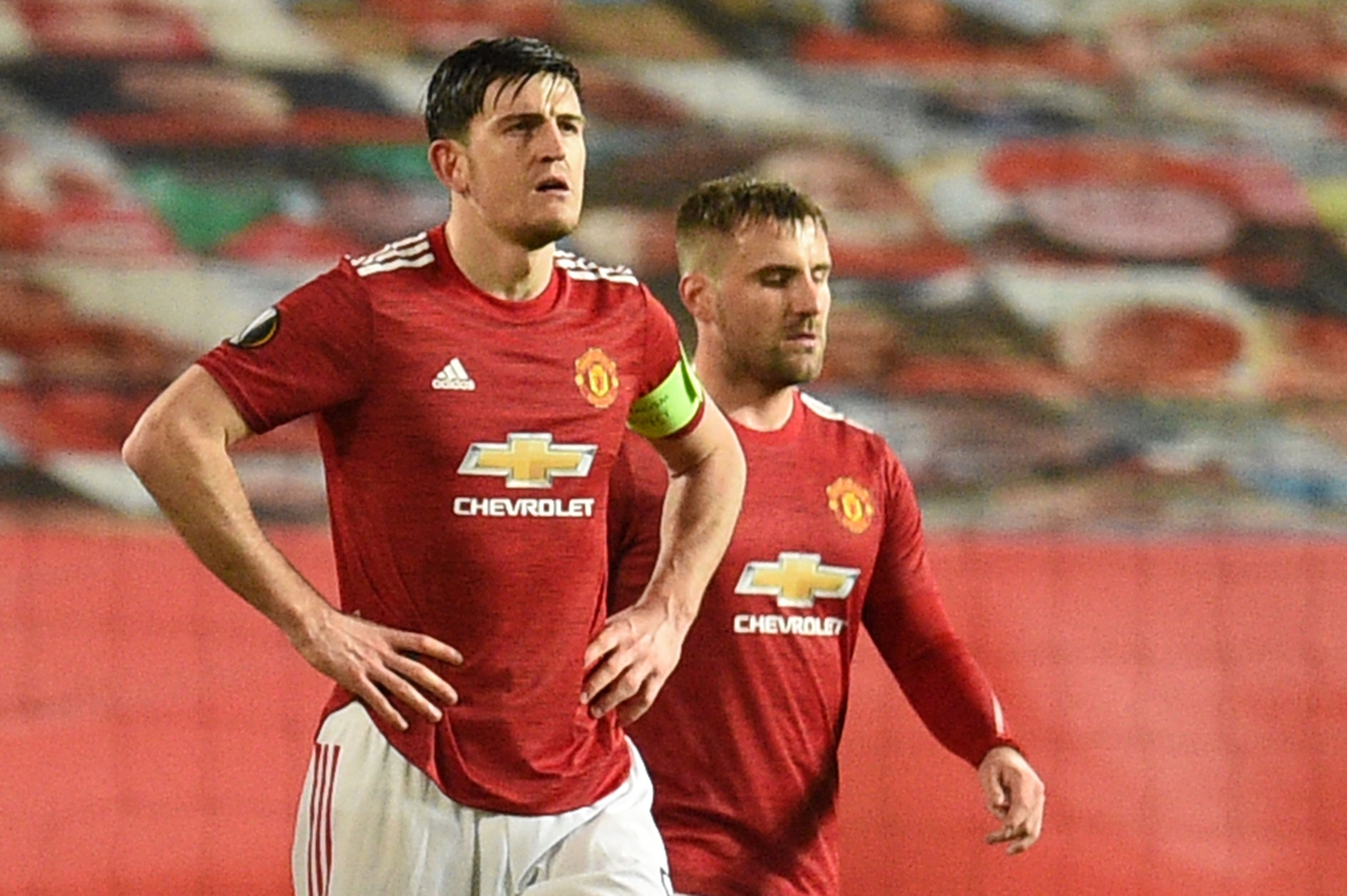Duet bek Manchester United Harry Maguire (kiri) dan Luke Shaw.