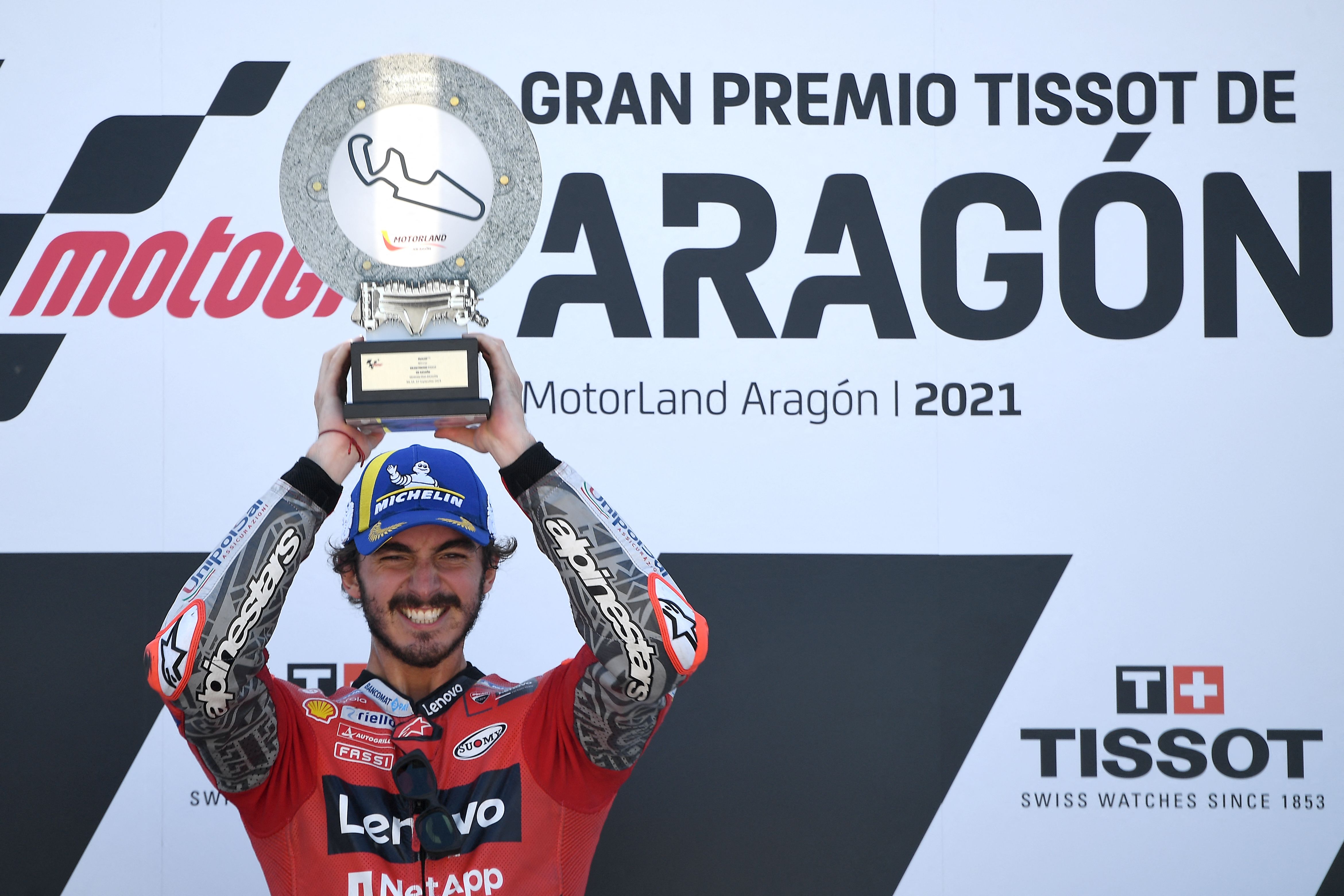 Pembalap Ducati Francesco Bagnaia melakukan selebrasi usai menjuarai GP Aragon.