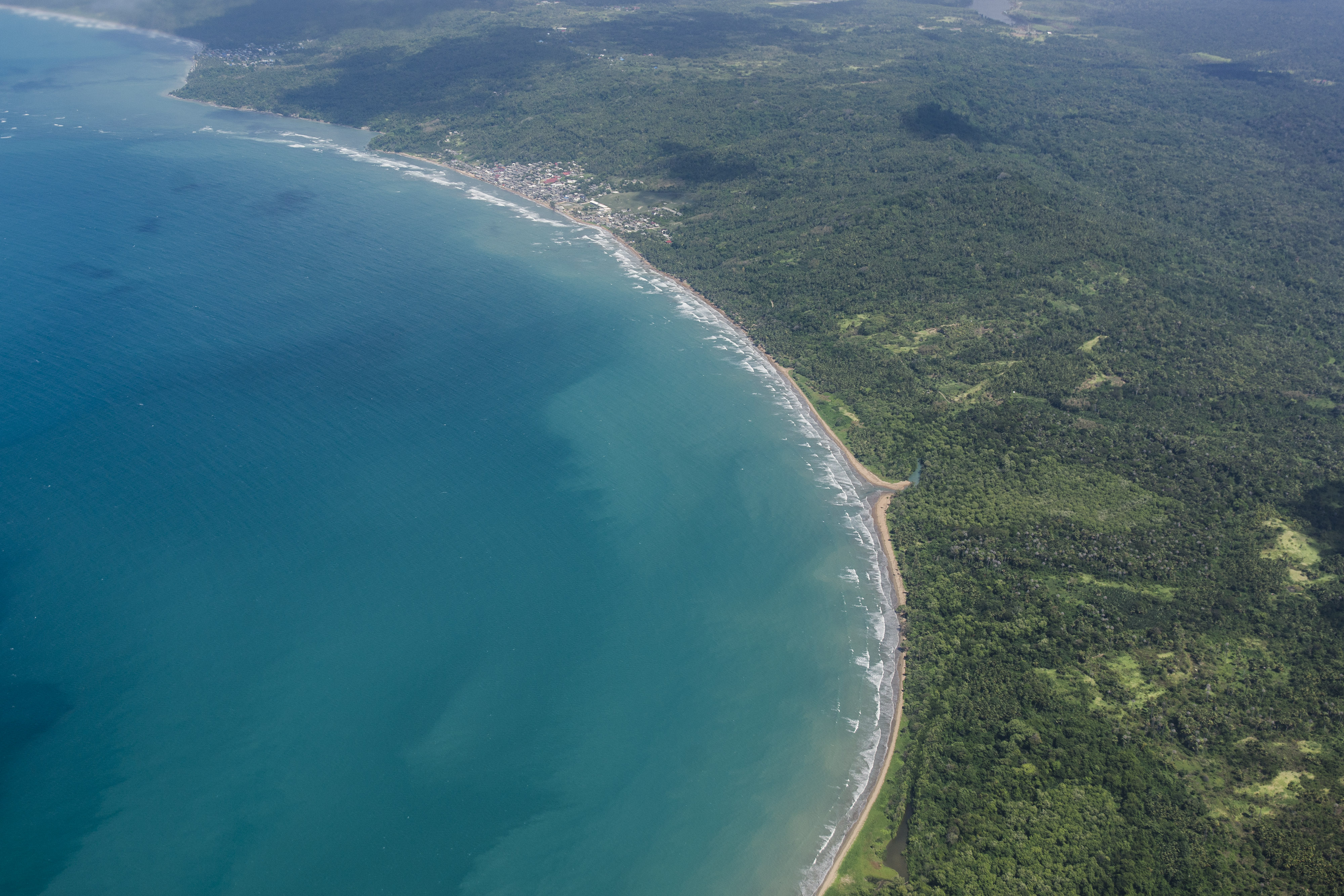 Permukiman di tepi pantai terlihat dari udara di Kabupaten Kepulauan Tanimbar, Provinsi Maluku.