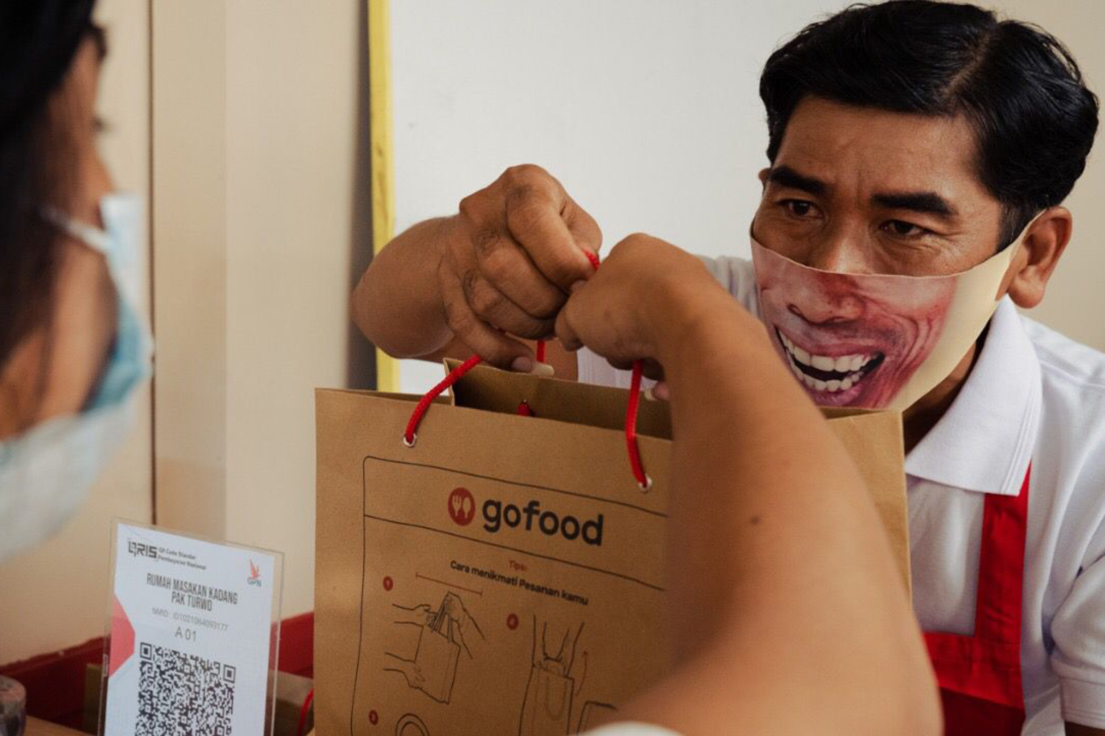 Pemesanan makanan melalui Gofood oleh Gojek.