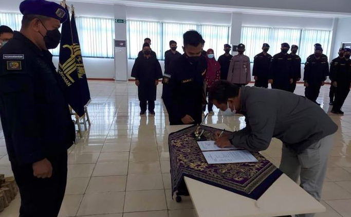 Ilsutrasi Ikrar setia 23 eks napiter Poso itu dilakukan di Iyato beach Poso, Senin (11/10). 