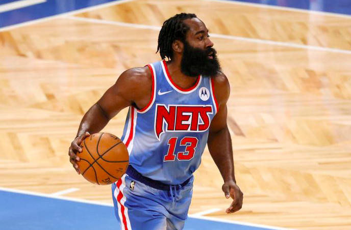 Aksi pemain Brooklyn Nets, James Harden, mendribel bola saat timnya melawan Orlando Magic.