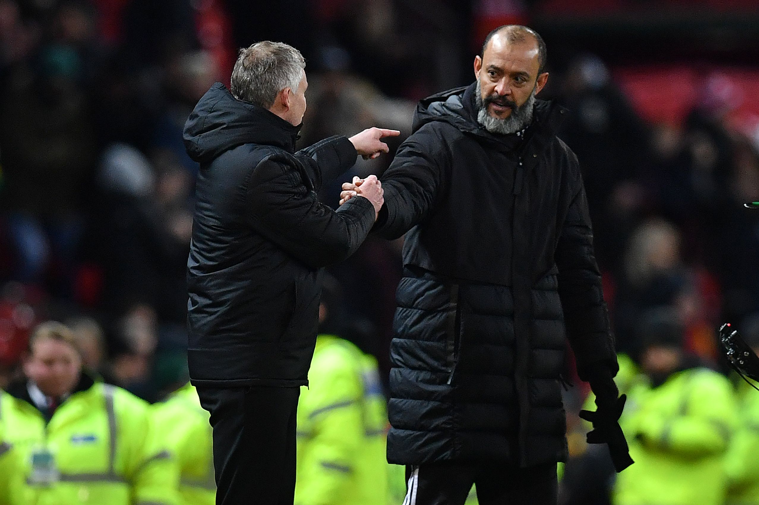 Ole Gunnar Solskjaer (kiri) dan Nuno Espirito Santo 