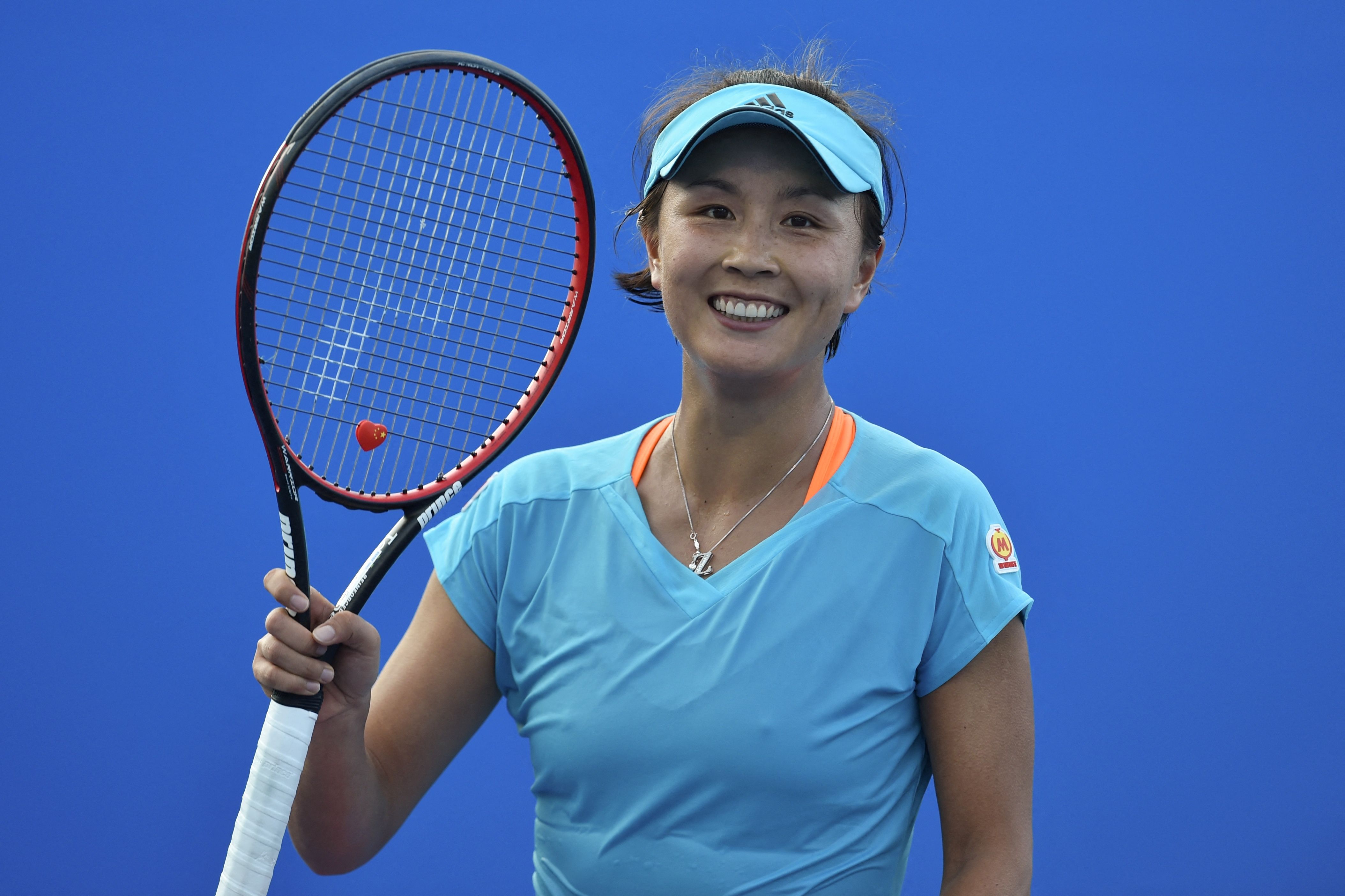 Petenis Tiongkok Peng Shuai saat berlangga di turnamen grand slam Autralia Terbuka 2021 pada Februari 2021.