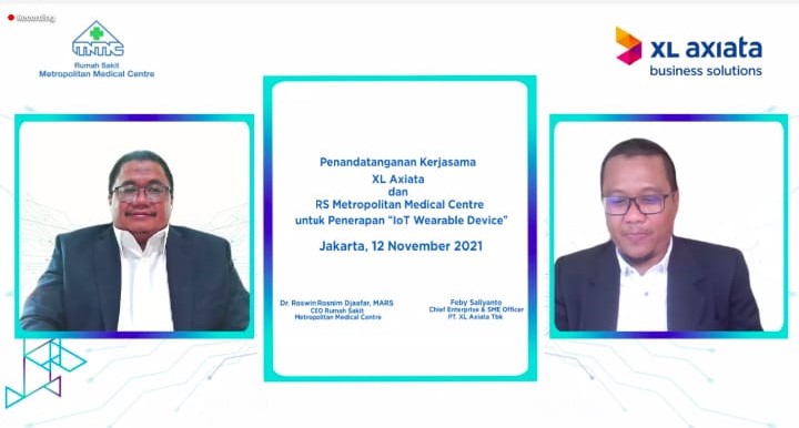 EO Rumah Sakit Metropolitan Medical Centre, Dr. Roswin Rosnim Djaafar, MARS dan Chief of Enterprise & SME Officer XL Axiata, Feby Sallyanto,