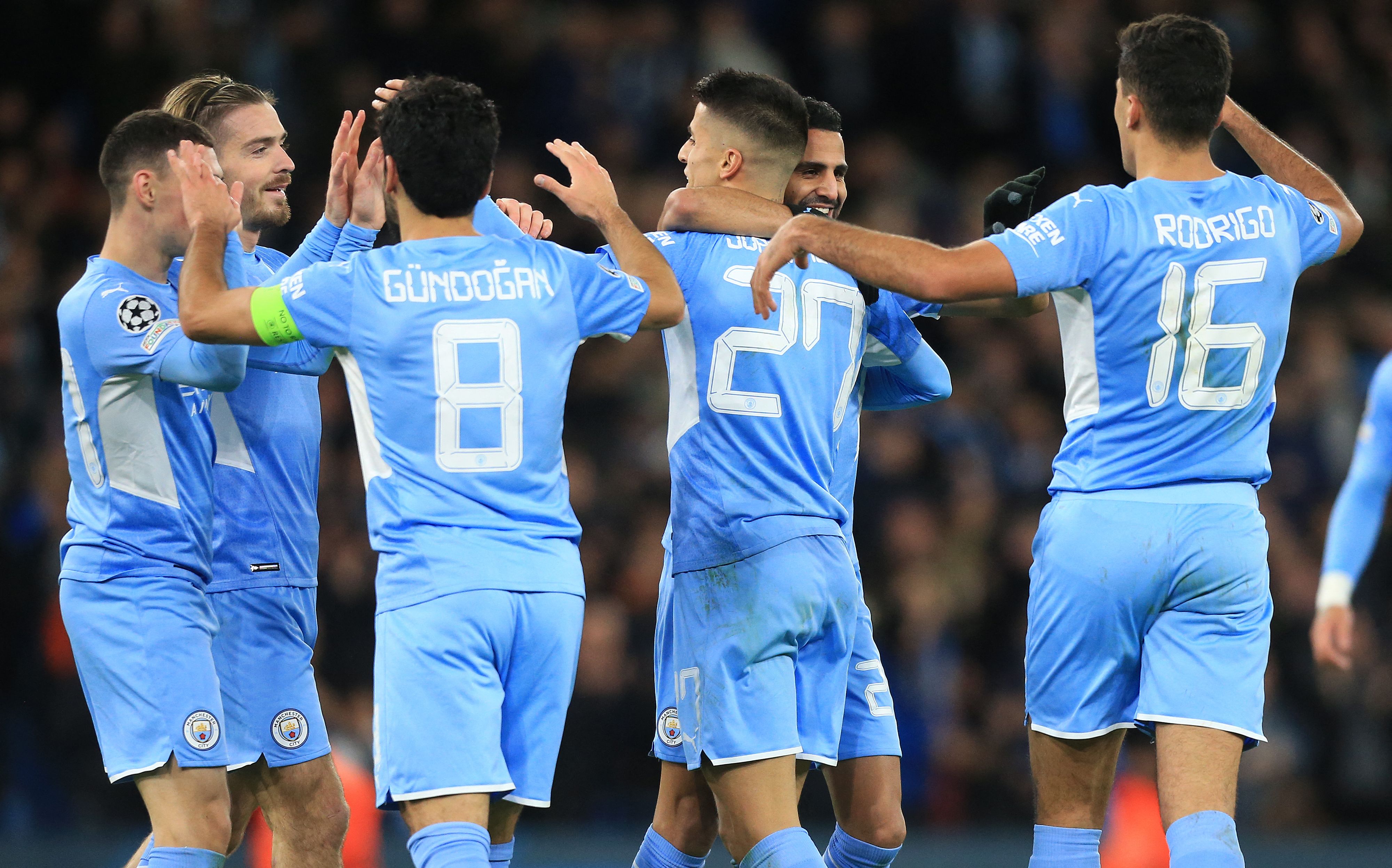 Para pemain Manchester City melakukan selebrasi usai mencetak gol ke gawnag Club Brugge di laga Liga Champions.