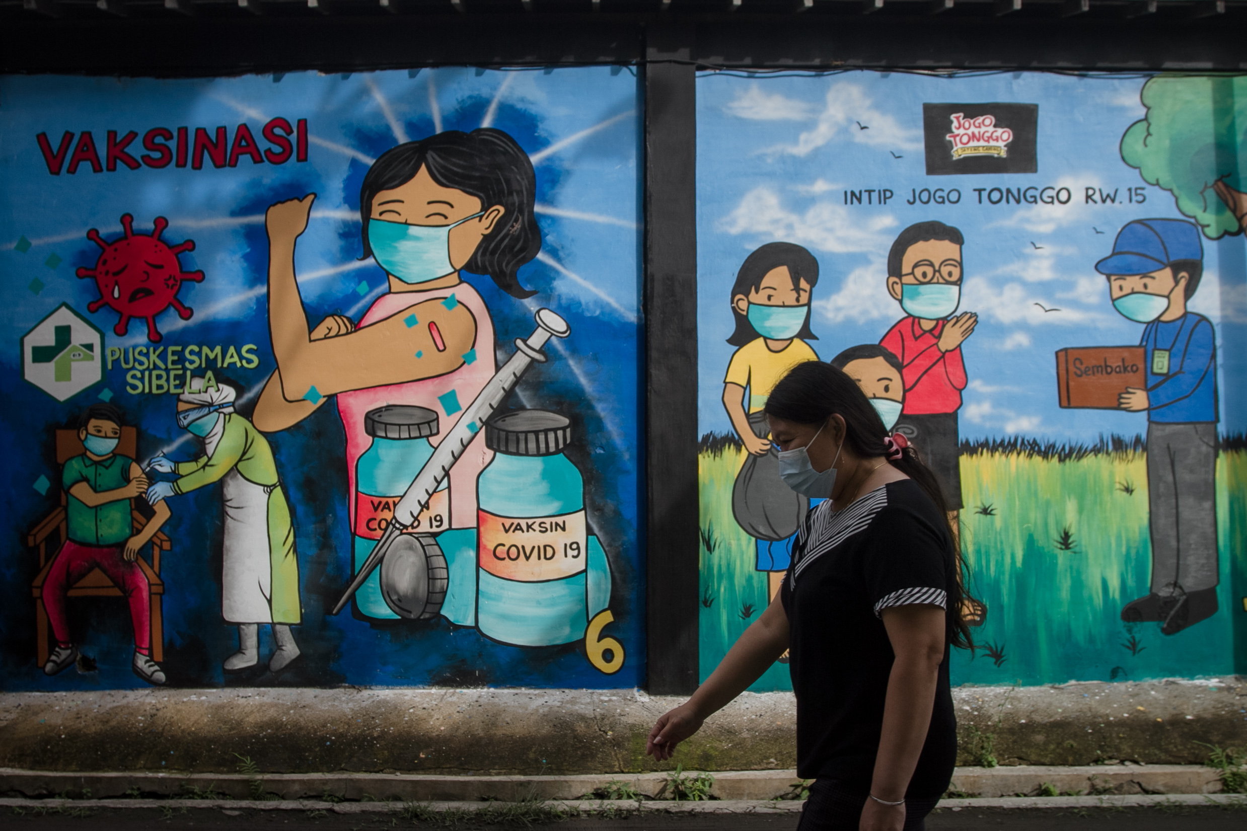 Mural peringatan bahaya Covid-19 di Solo, Jawa Tengah