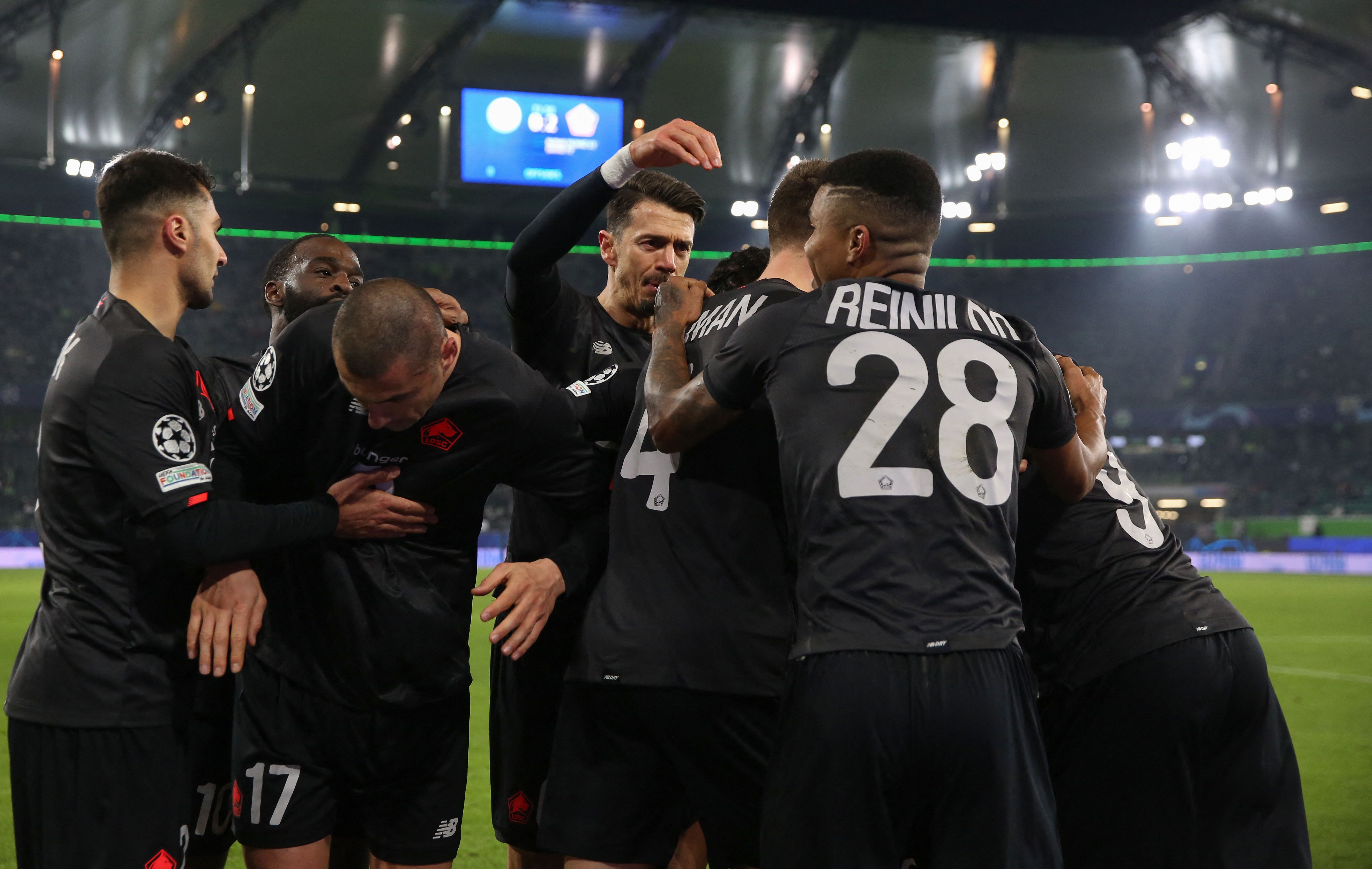 Para pemain Lille melakukan selebrasi usai mencetak gol ke gawnag Wolfsburg di laga Liga Champions.