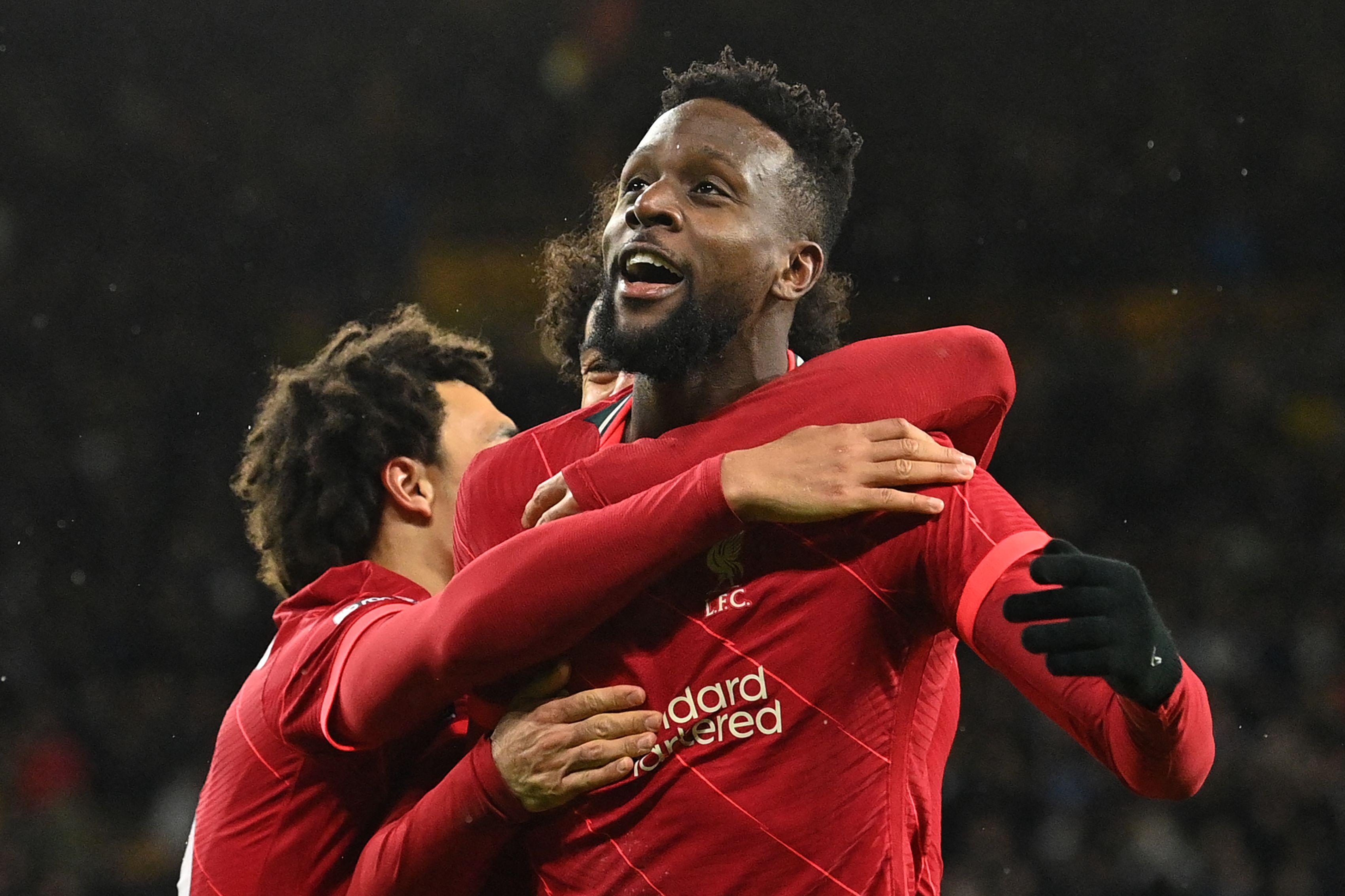 Penyerang Liverpool Divock Origi melakukan selebrasi usai mencetak gol ke gawang Wolverhampton di laga Liga Primer Inggris.