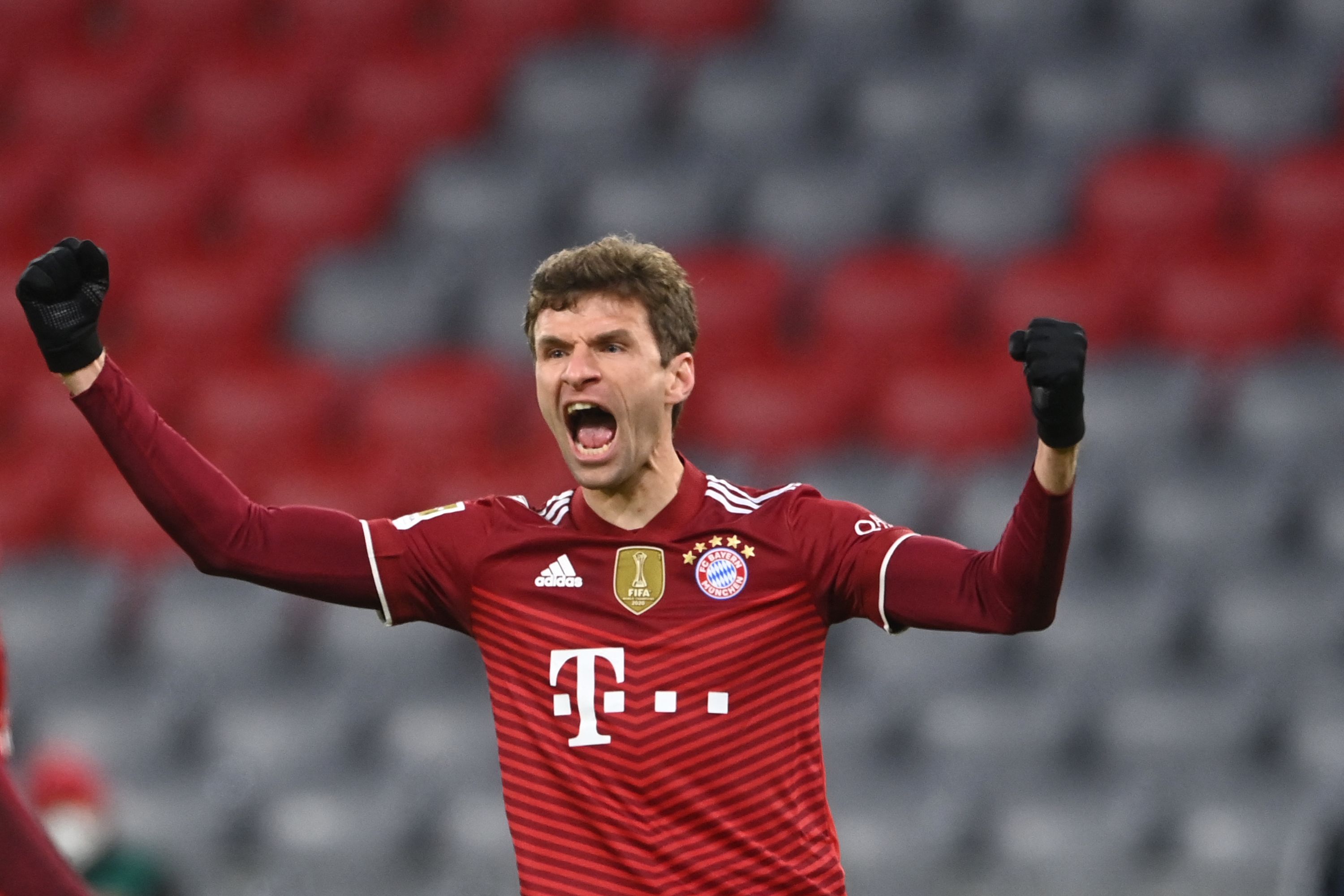 Penyerang Bayern Thomas Mueller melakukan selebrasi usai mencetak gol ke gawang Wolfsburg di laga Bundesliga.