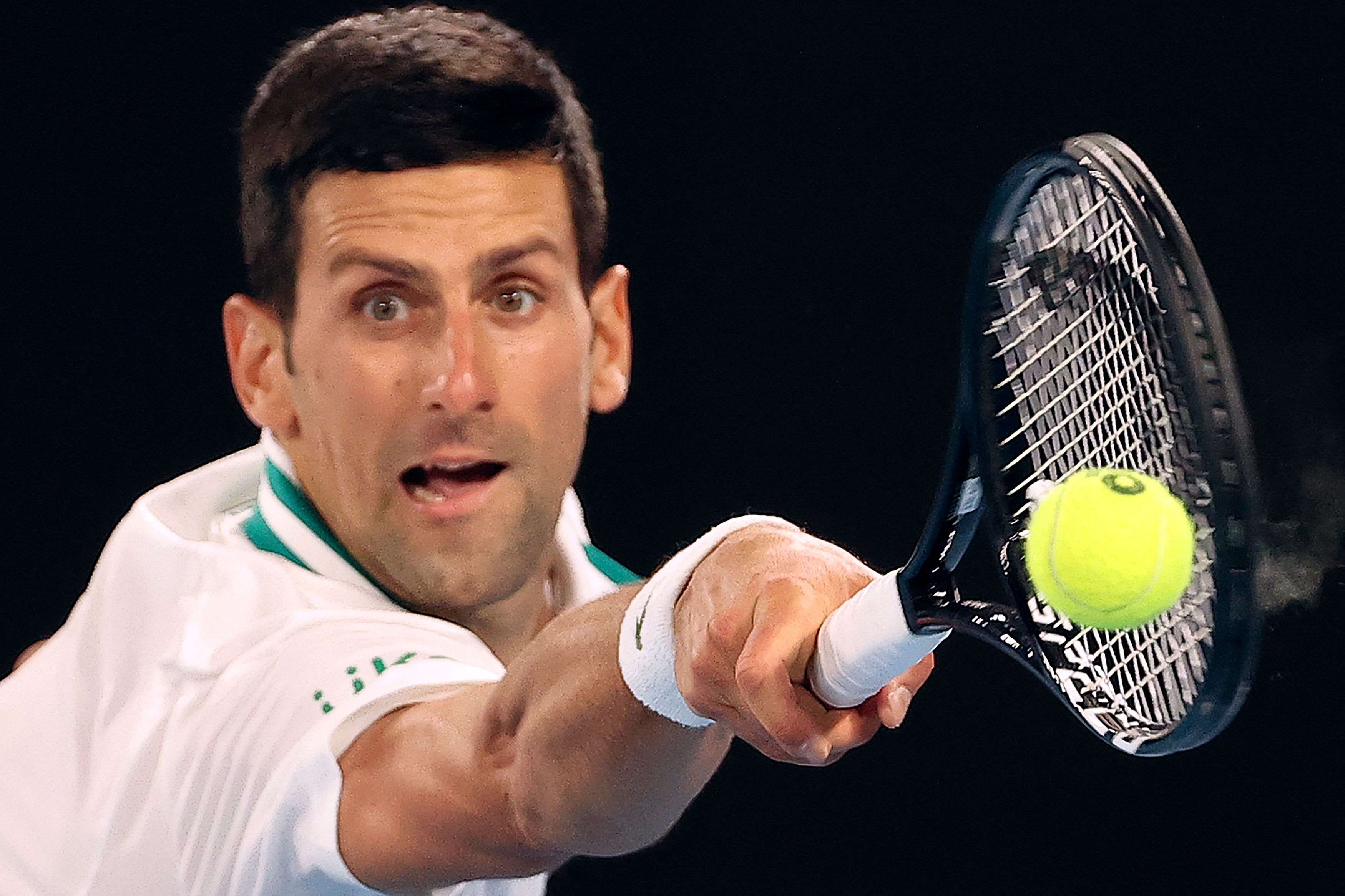 Aksi Novak Djokovic saat tampil di turnamen Australia Terbuka 2021.