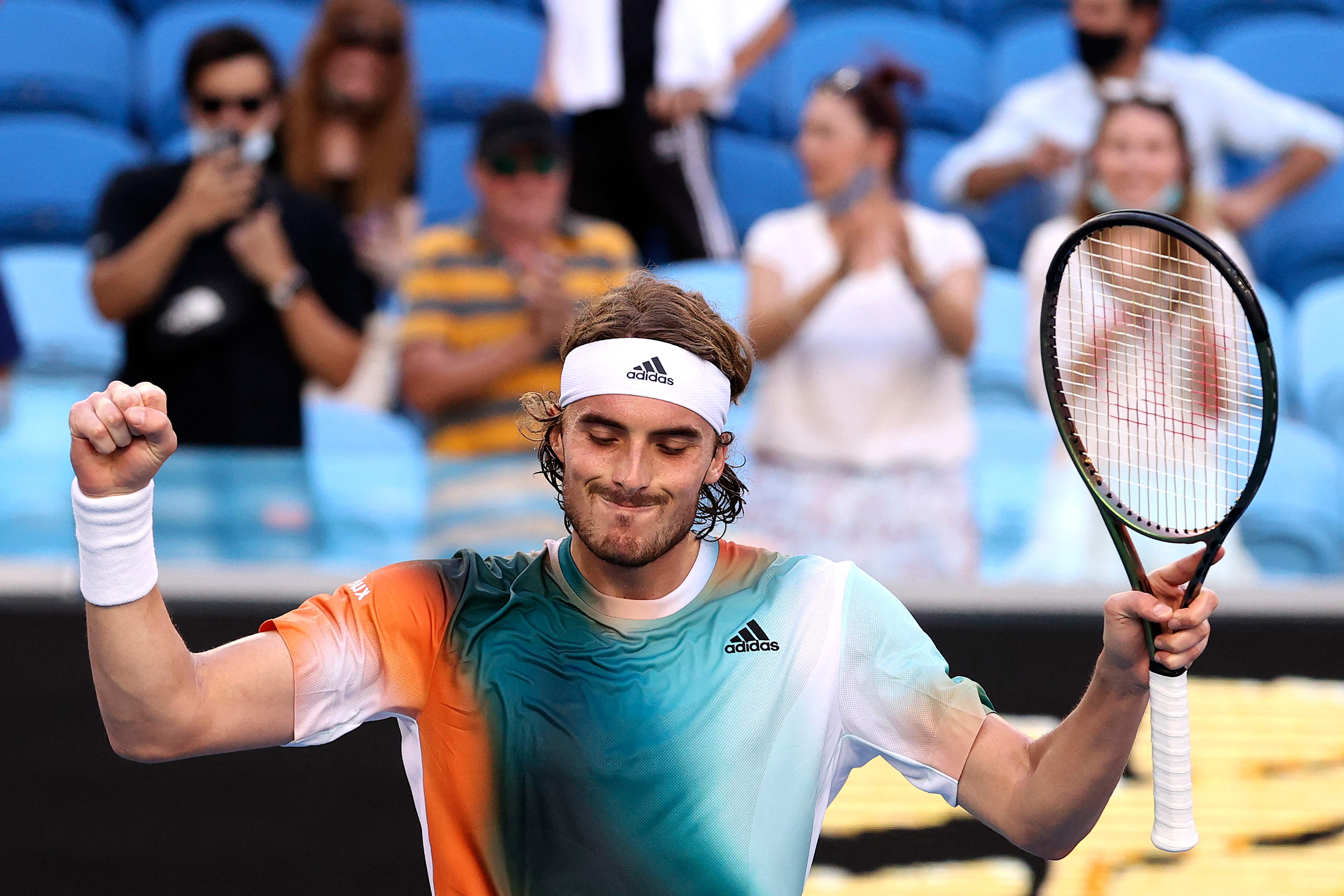 Petenis Yunani Stefanos Tsitsipas melakukan selebrasi usai mengalahkan Sebastian Baez di laga Australia Terbuka.