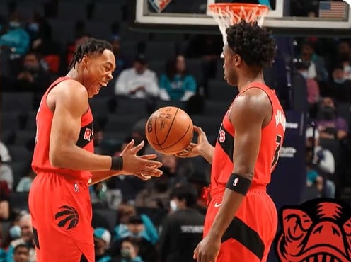 Para pemain Toronto Raptors melakukan selebrasi usai mengalahkan Charlotte Hornets di laga NBA.