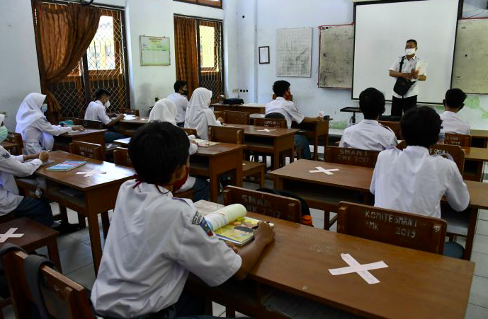 Ilustrasi sekolah tatap muka.