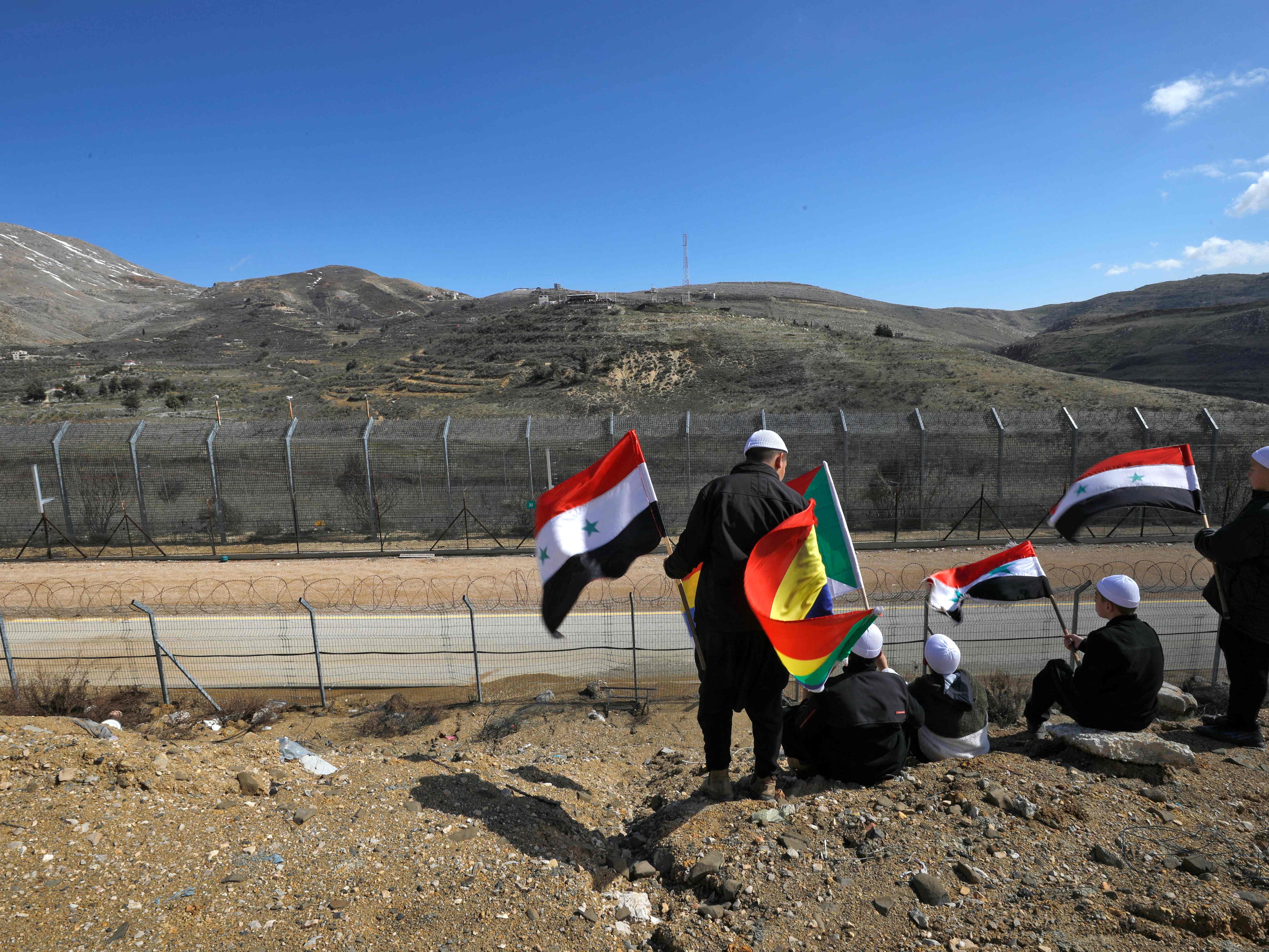 Penduduk Druze di Dataran Tinggi Golan berunjuk rasa di desa Majdal Shams di Dataran Tinggi Golan yang dicaplok Israel, 14 Februari 2022.
