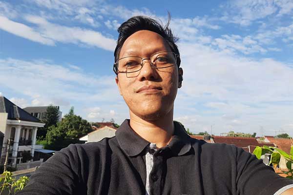 Staf pengembangan aplikasi BAZNAS  yang juga penyandang disabilitas tunanetra Muhamad Adinugraha 