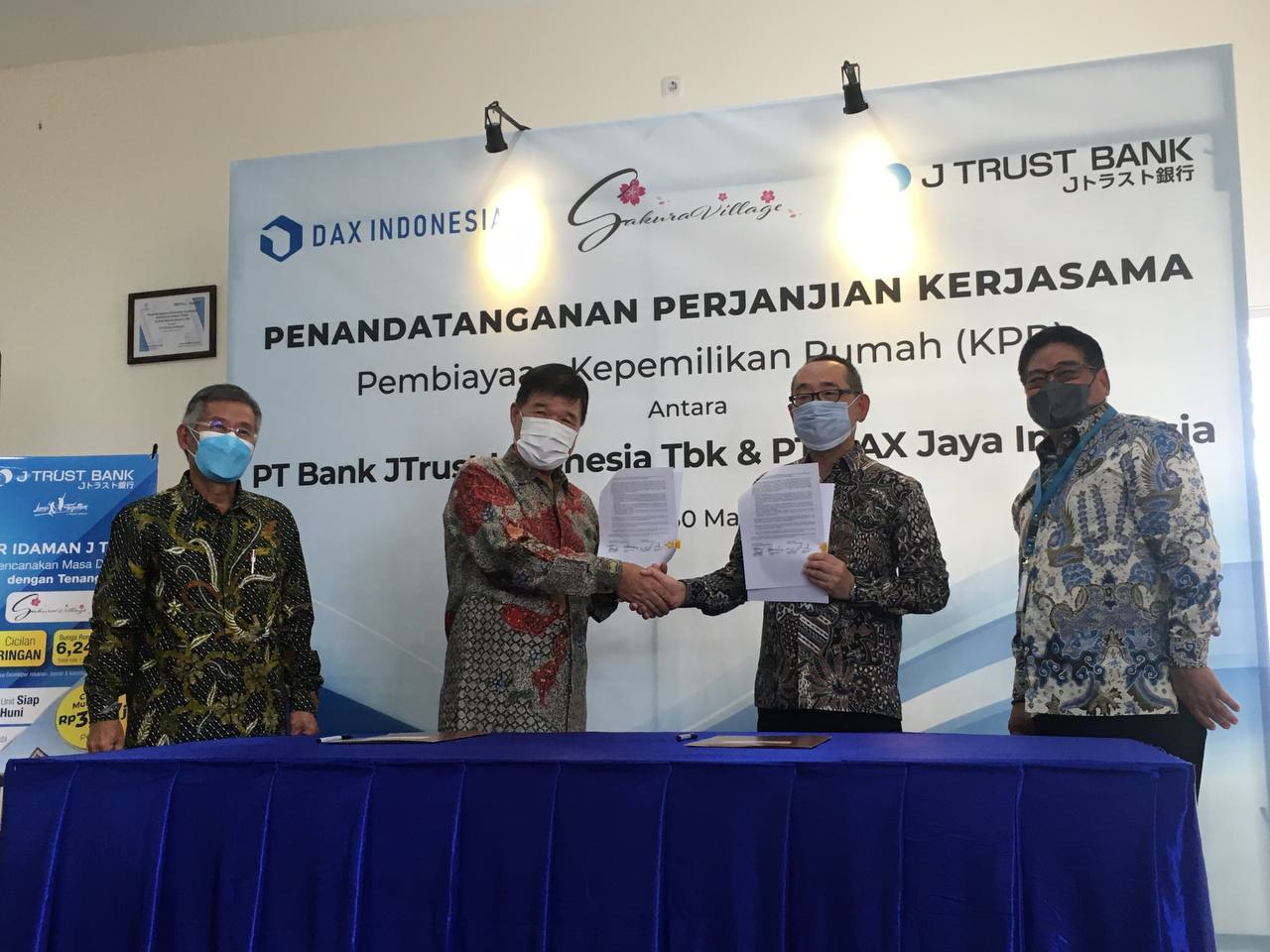 Penandatanganan kerja sama PT Bank JTrust Indonesia Tbk dan PT DAX Jaya Indonesia.