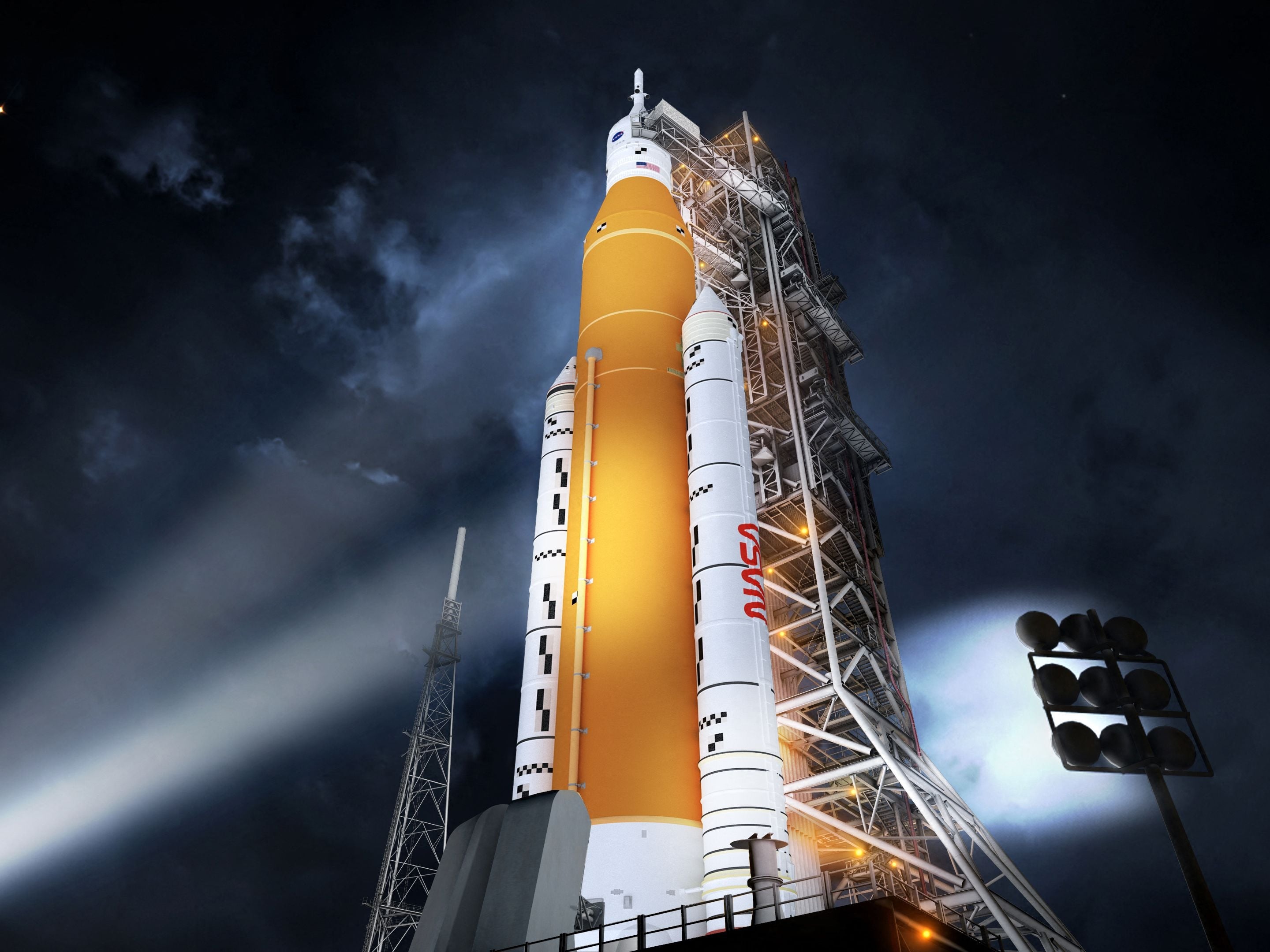 Roket baru NASA, Space Launch System (SLS), dalam konfigurasi kendaraan awak Blok 1 yang akan mengirim astronot ke Bulan pada misi Artemis.