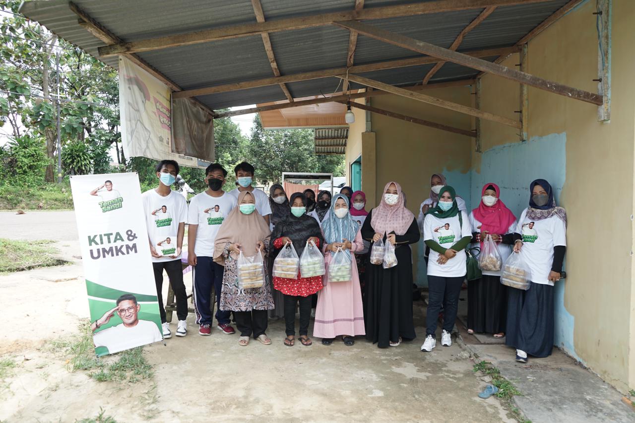 Aksi sosial relawan Teman Sandi Jambi, Minggu (27/3).