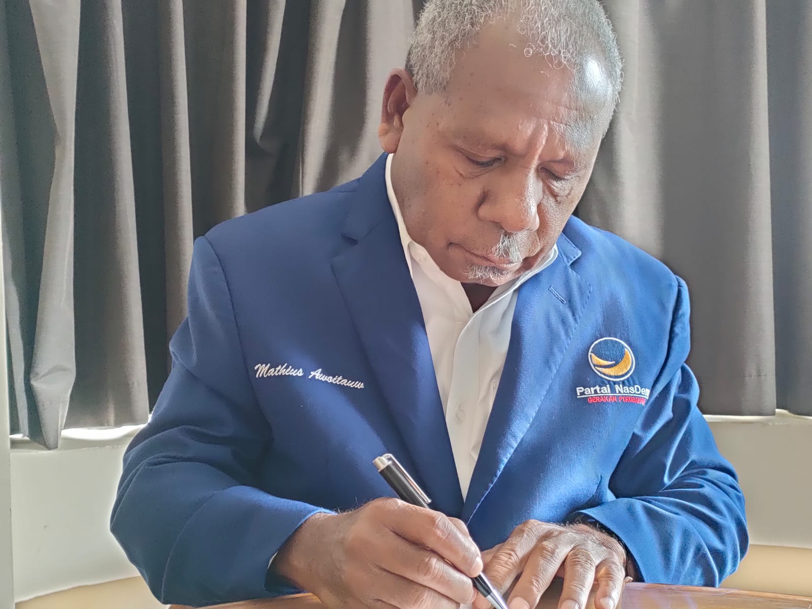 Ketua DPW NasDem papua Mathius Awoitauw